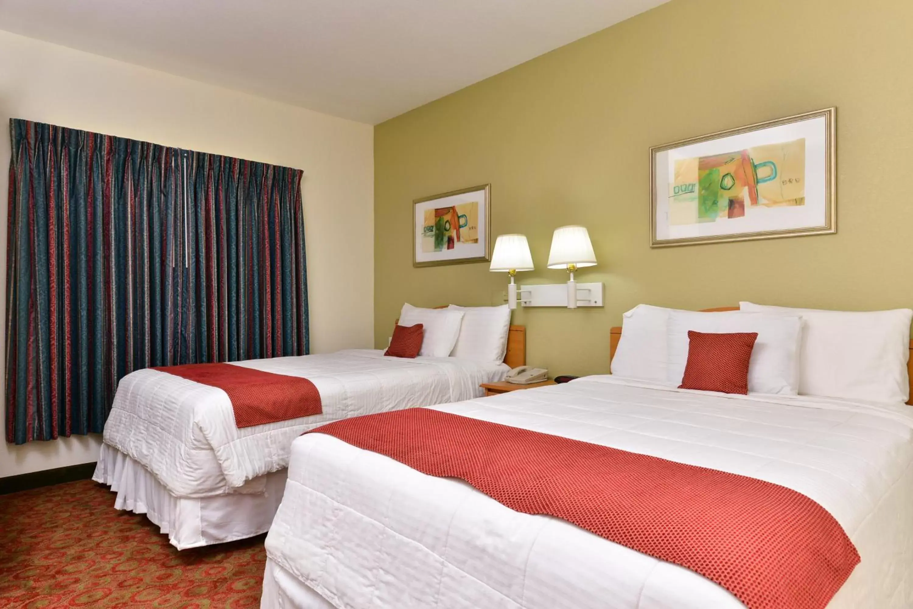 Bed in Americas Best Value Inn & Suites-Winnie