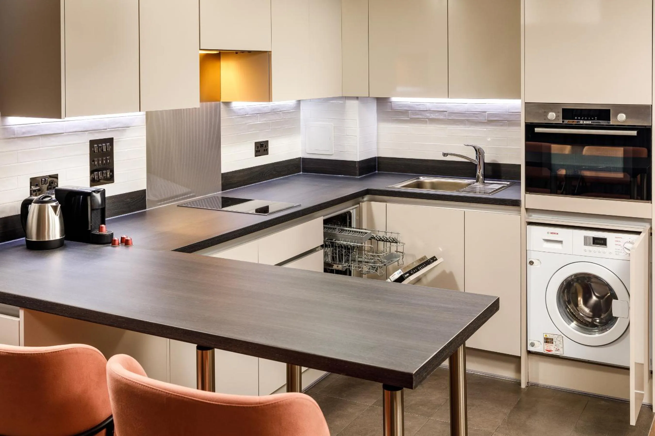 Kitchen or kitchenette in Aparthotel Adagio London Sutton Point