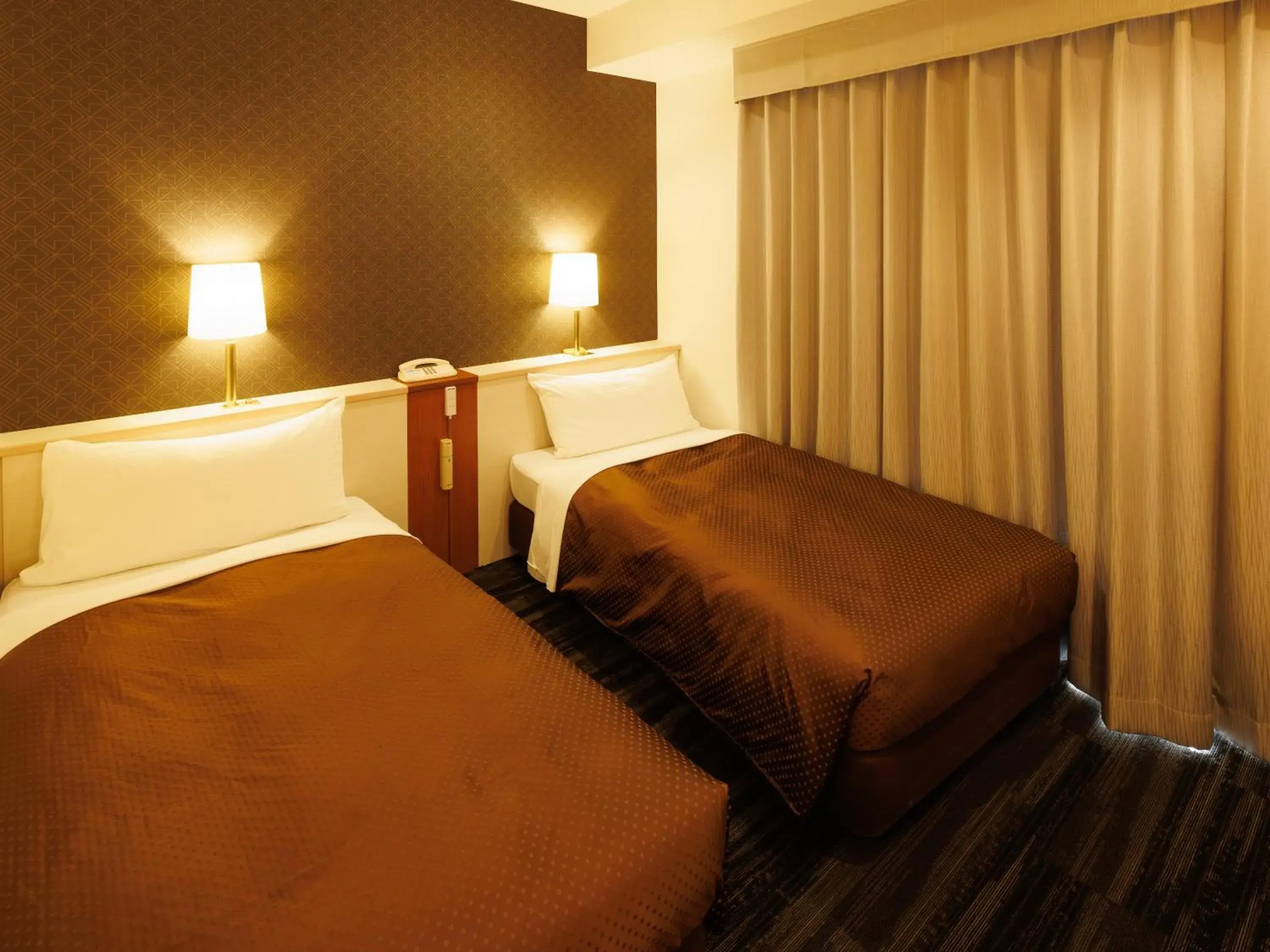 Photo of the whole room, Bed in J Hotel Rinku