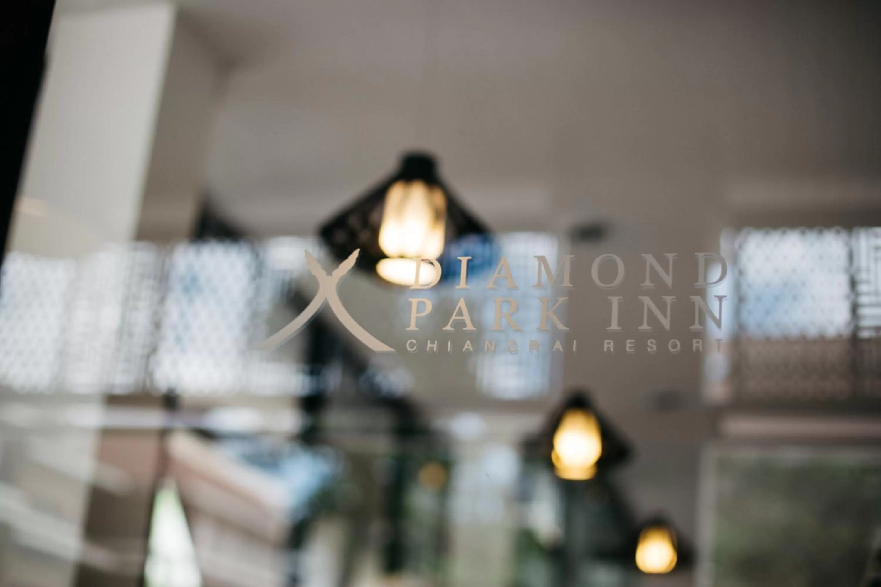 Property logo or sign in Diamond Park Inn Chiangrai & Resort