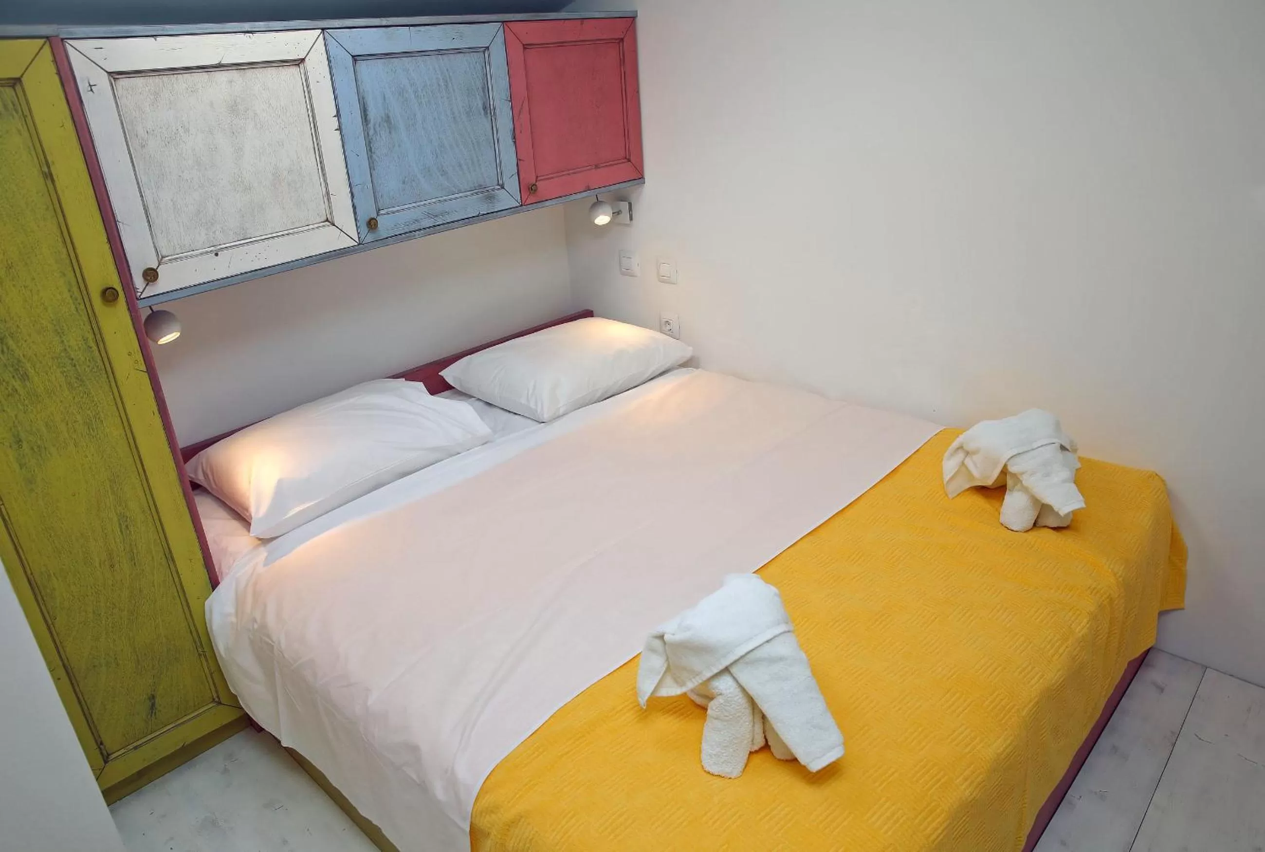 Bed in Central Apartments Integrated Hotel