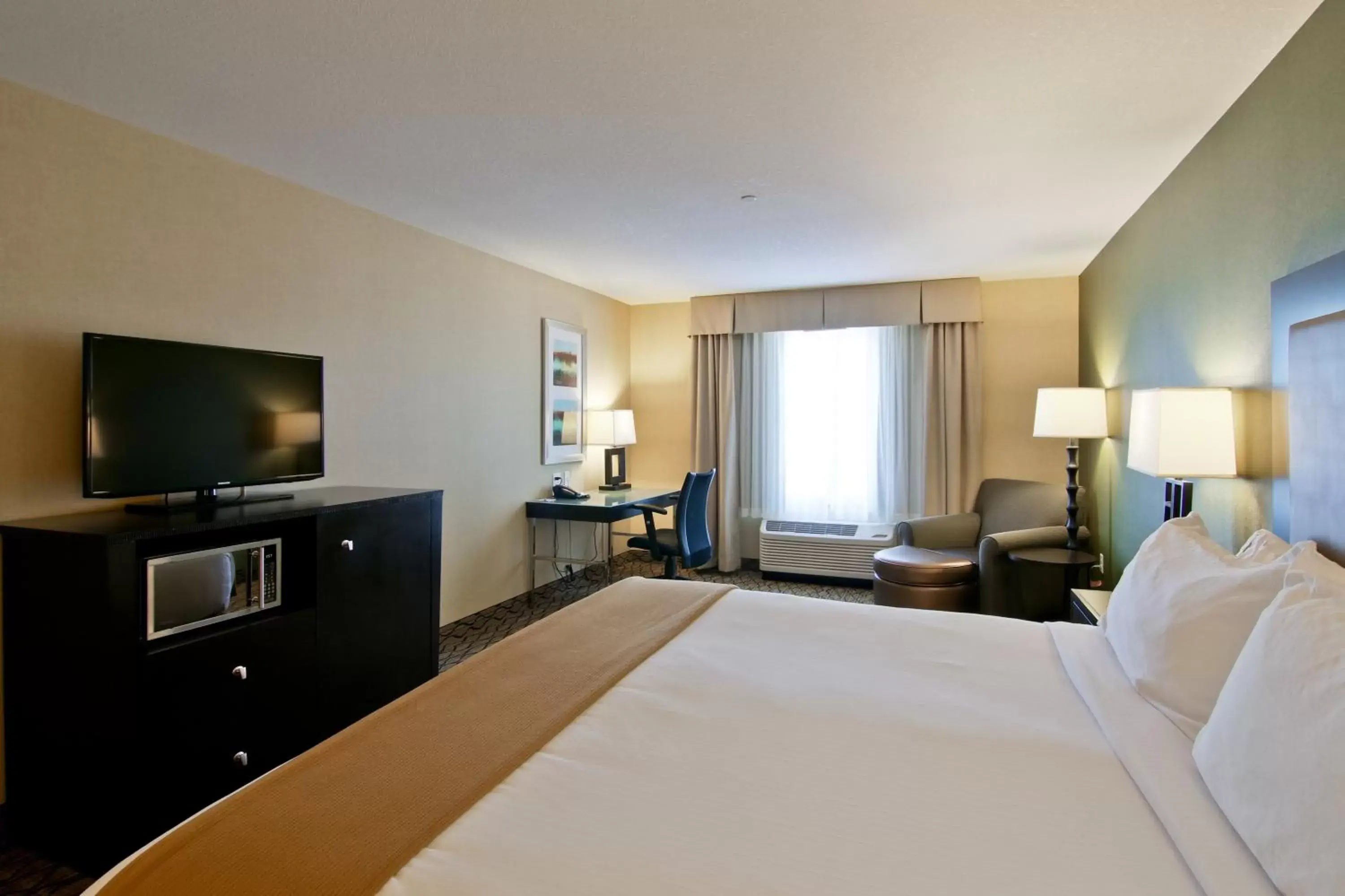 Photo of the whole room, TV/Entertainment Center in Holiday Inn Express Fort Saskatchewan, an IHG Hotel