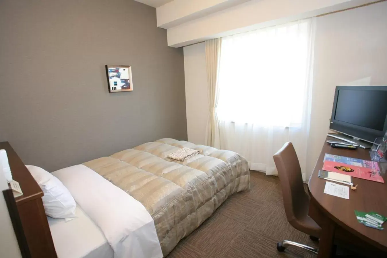 Bed in Hotel Route-inn Koriyama Inter