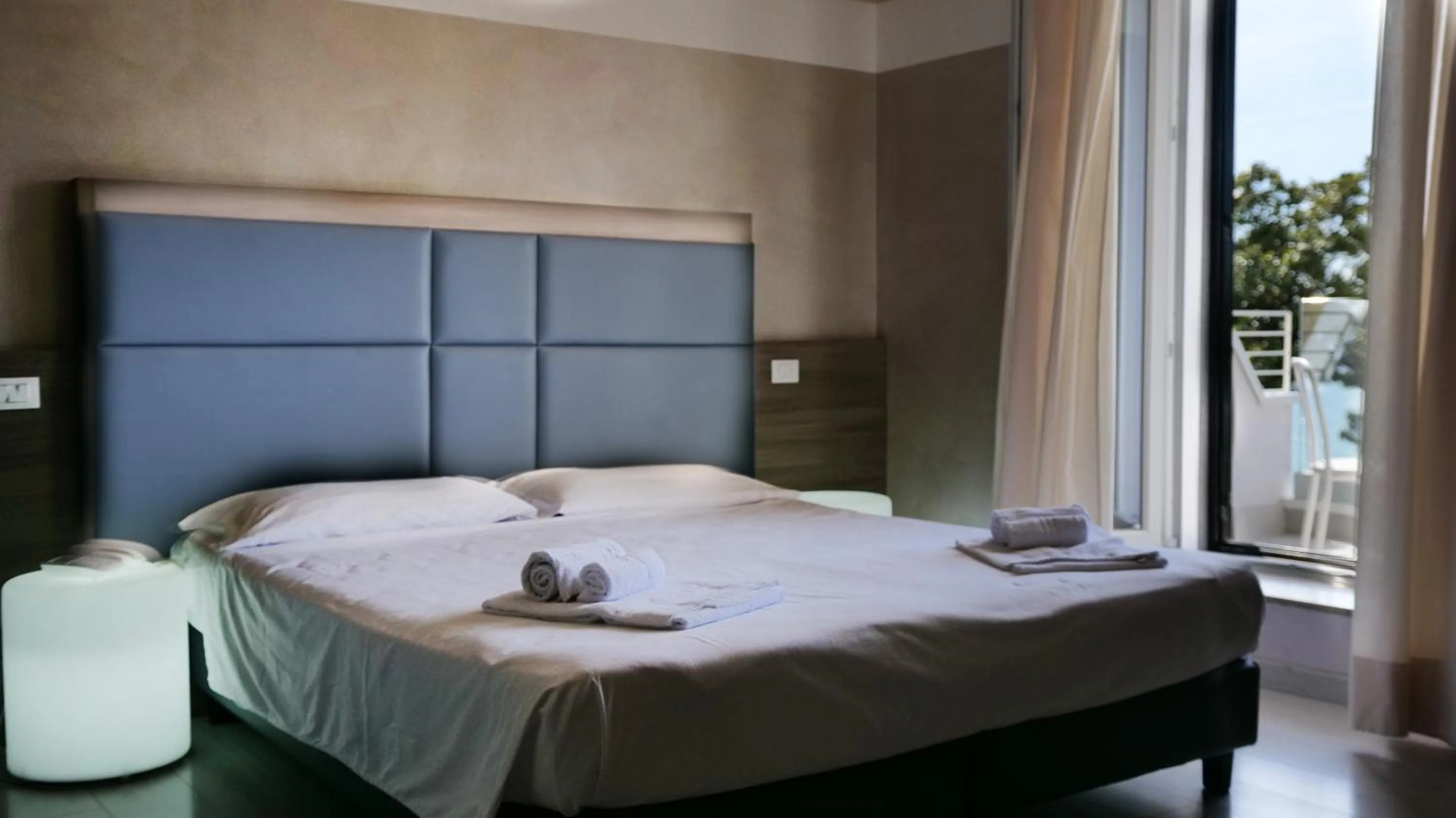 Bed in Hotel Riviera