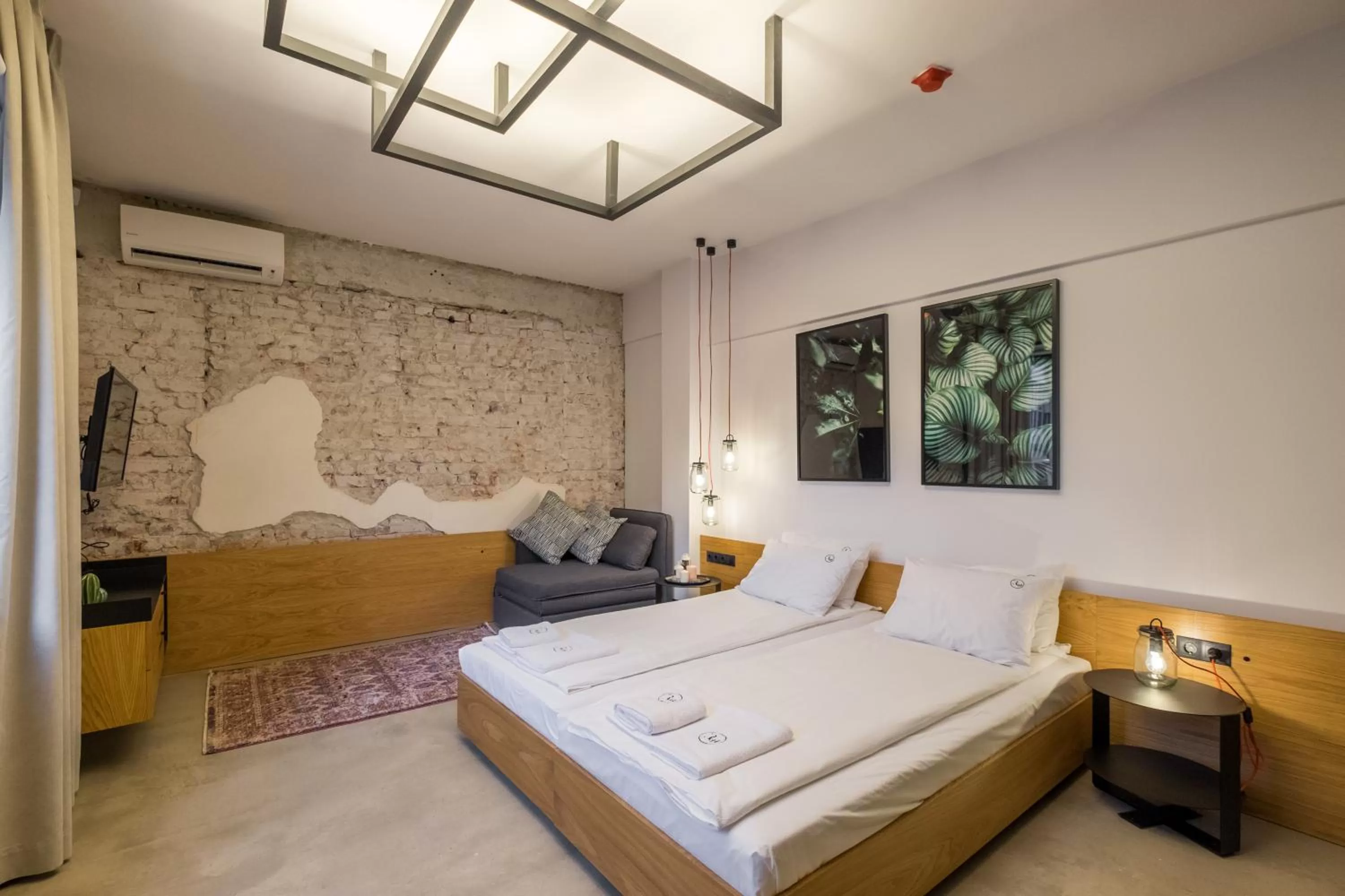 Bed in R34 Boutique Hotel