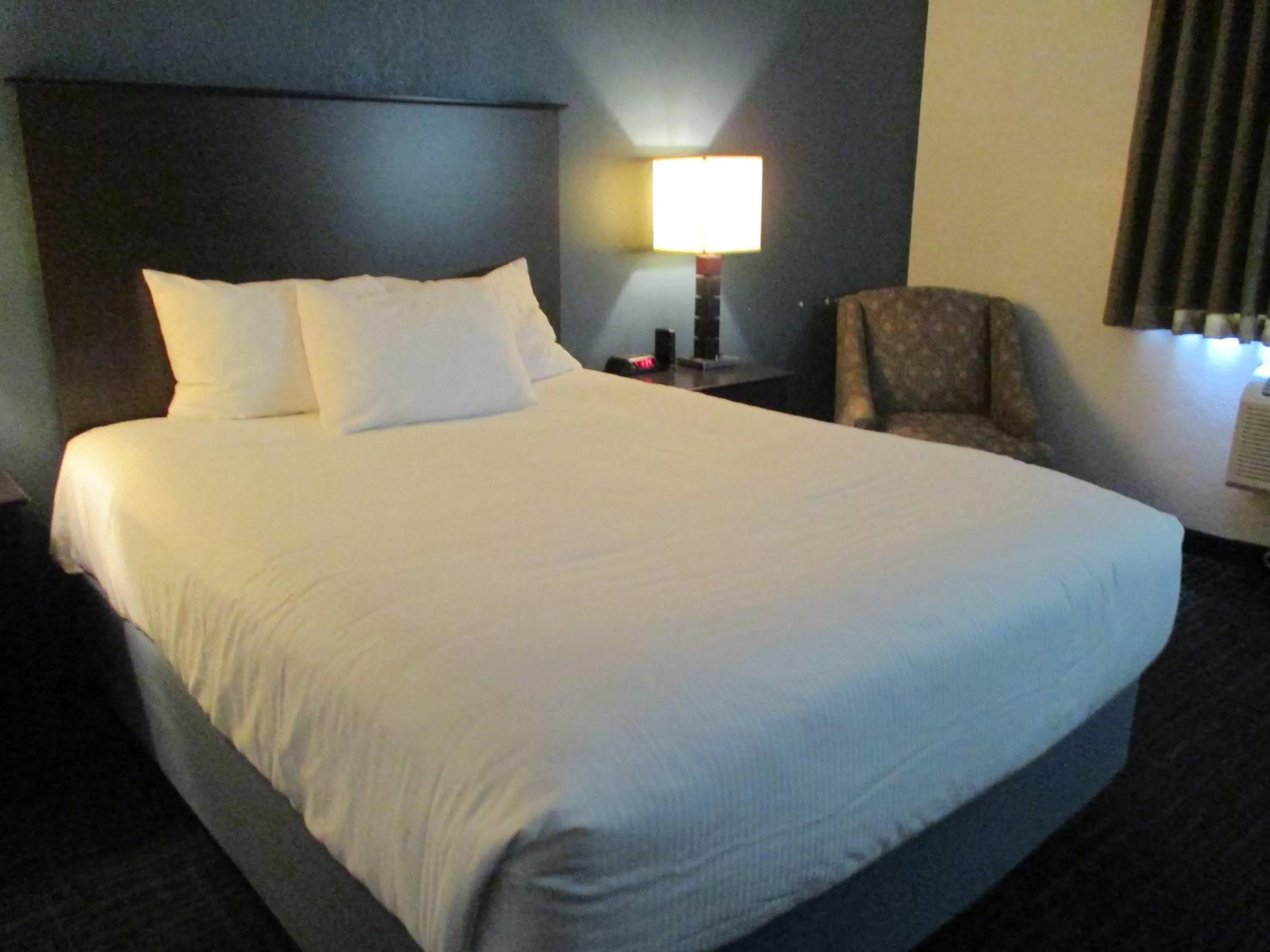 Photo of the whole room, Bed in AmericInn by Wyndham Hayward