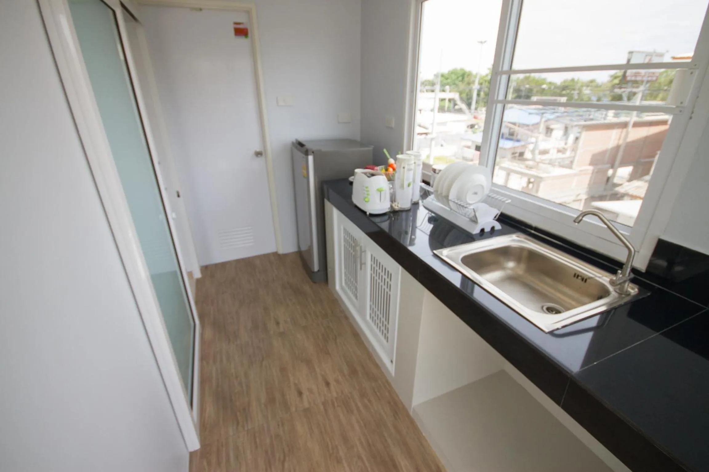 Kitchen or kitchenette in Charisma Residence