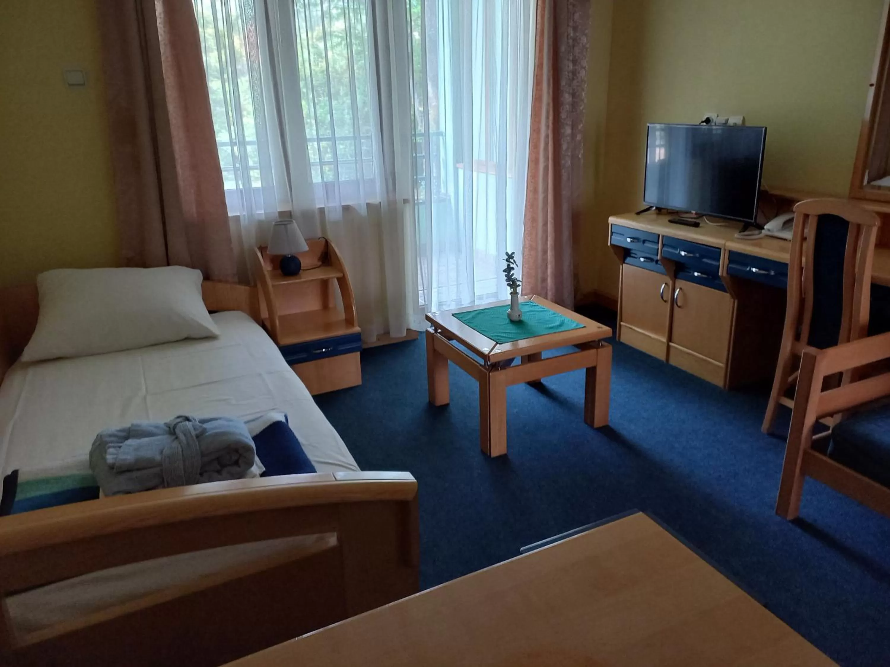 Text overlay, Bed in Garni Lupus prenoćište