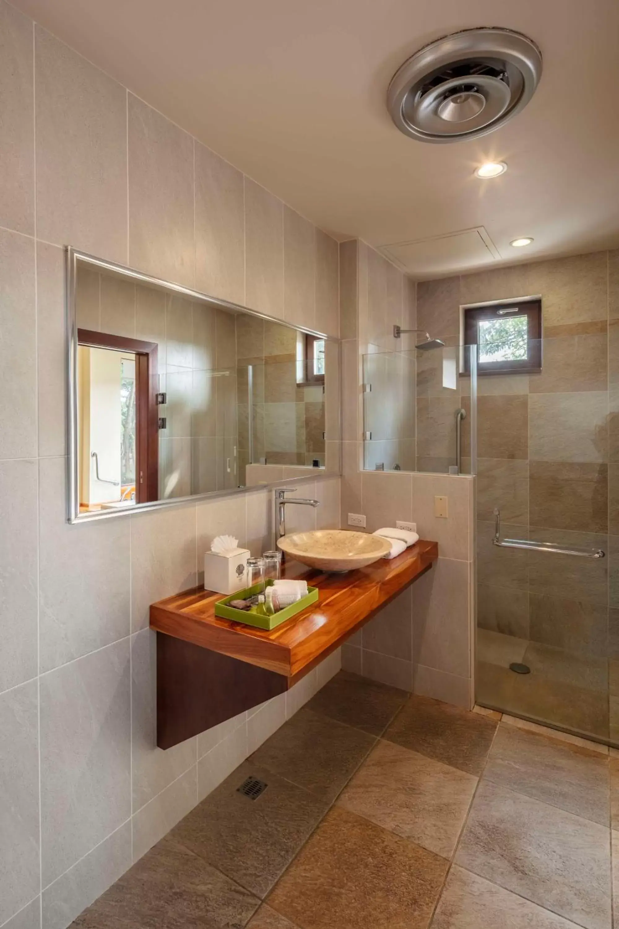 Bathroom in Indura Beach & Golf Resort Curio Collection By Hilton