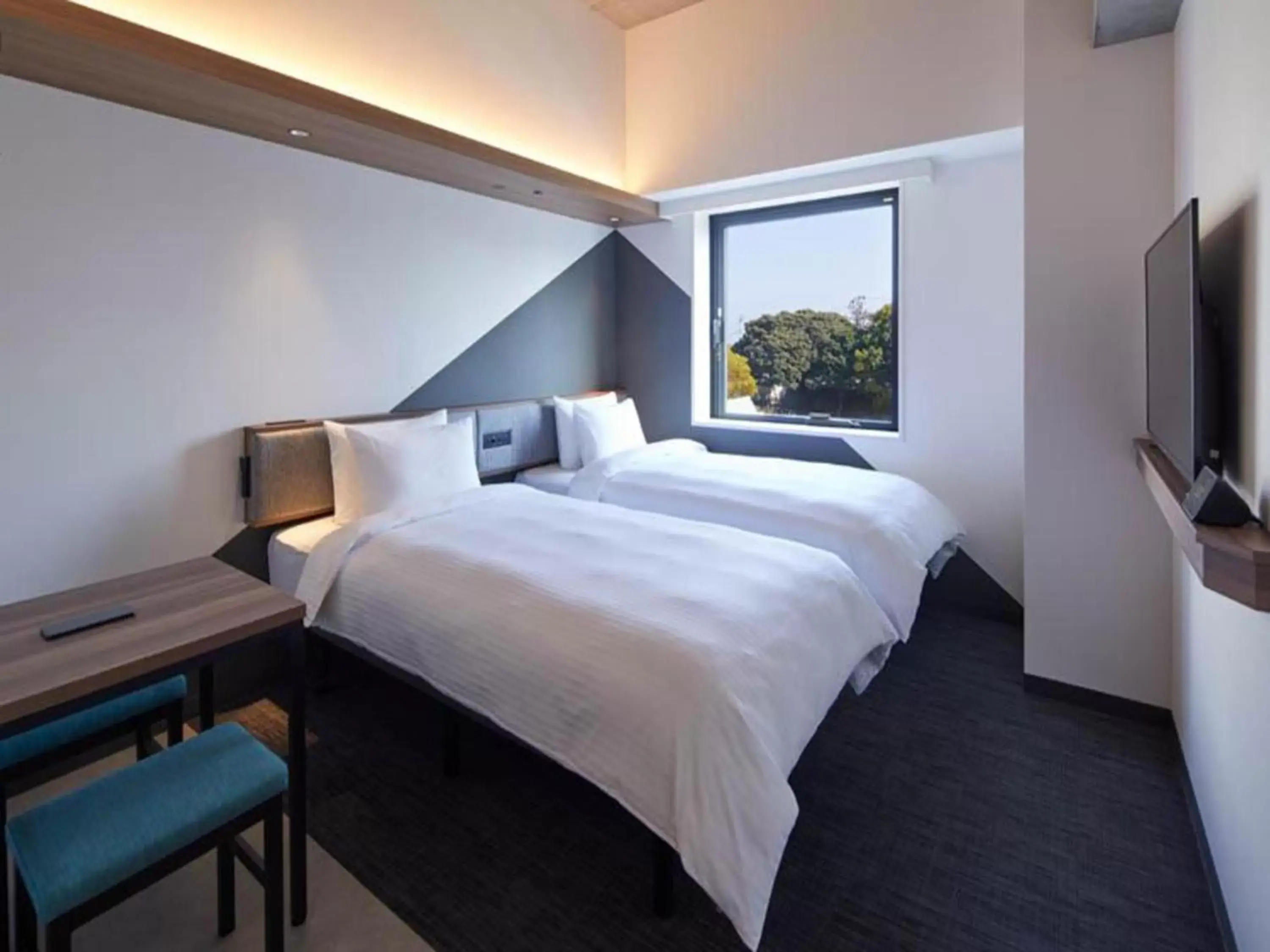 Bed in Prince Smart Inn Atami
