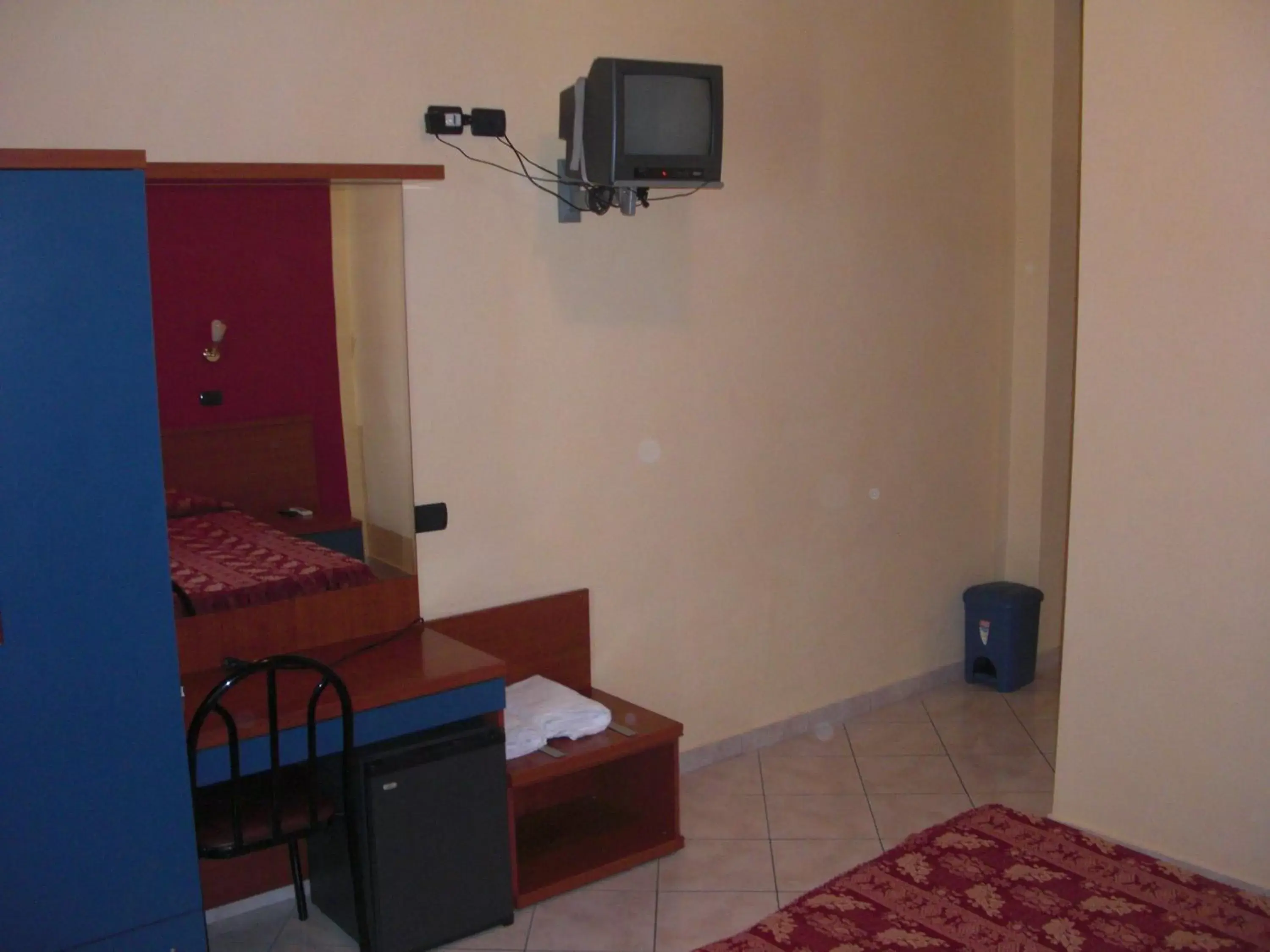 TV and multimedia, TV/Entertainment Center in Hotel Legnano