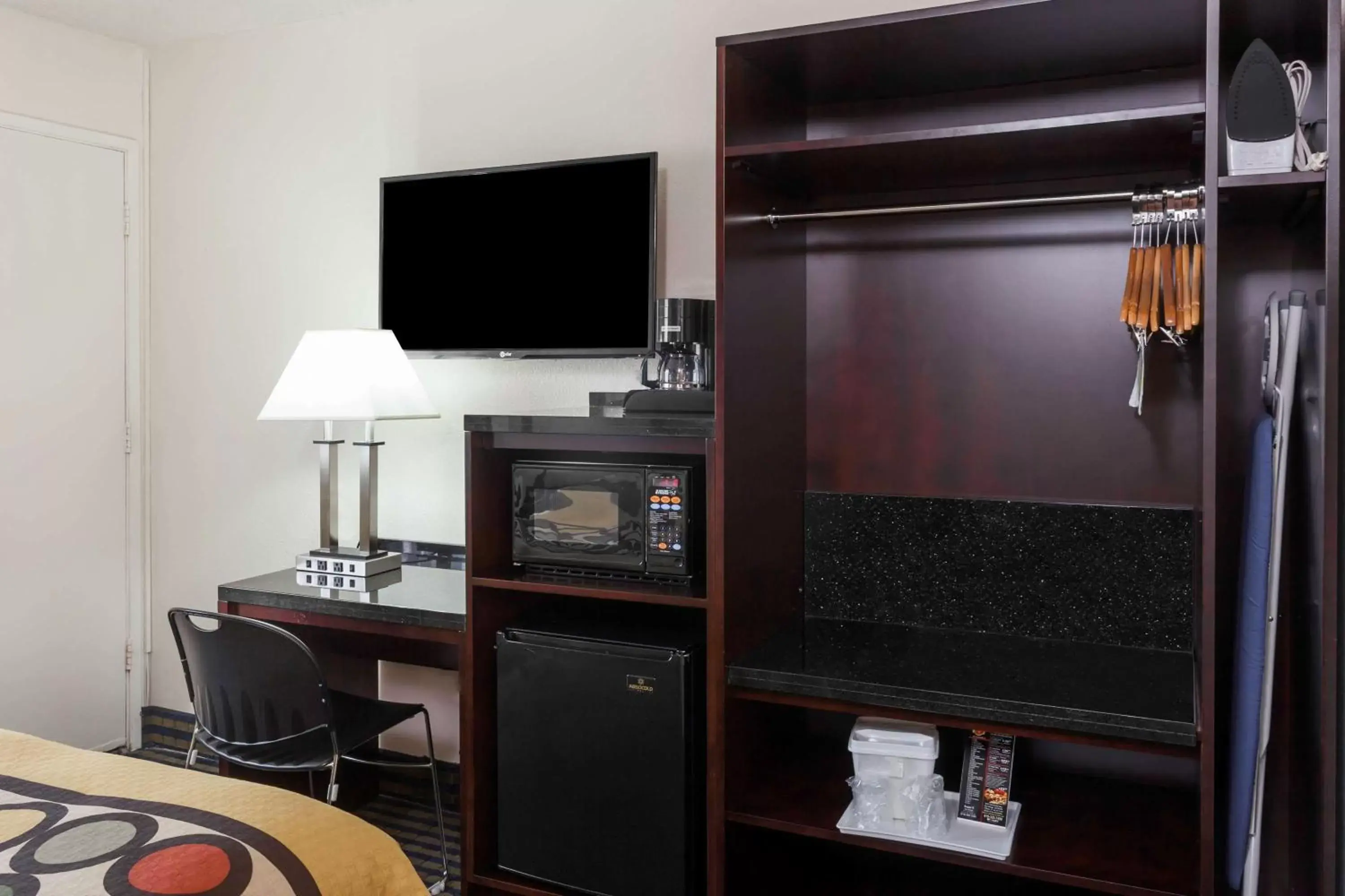 Photo of the whole room, TV/Entertainment Center in Super 8 by Wyndham San Diego Hotel Circle