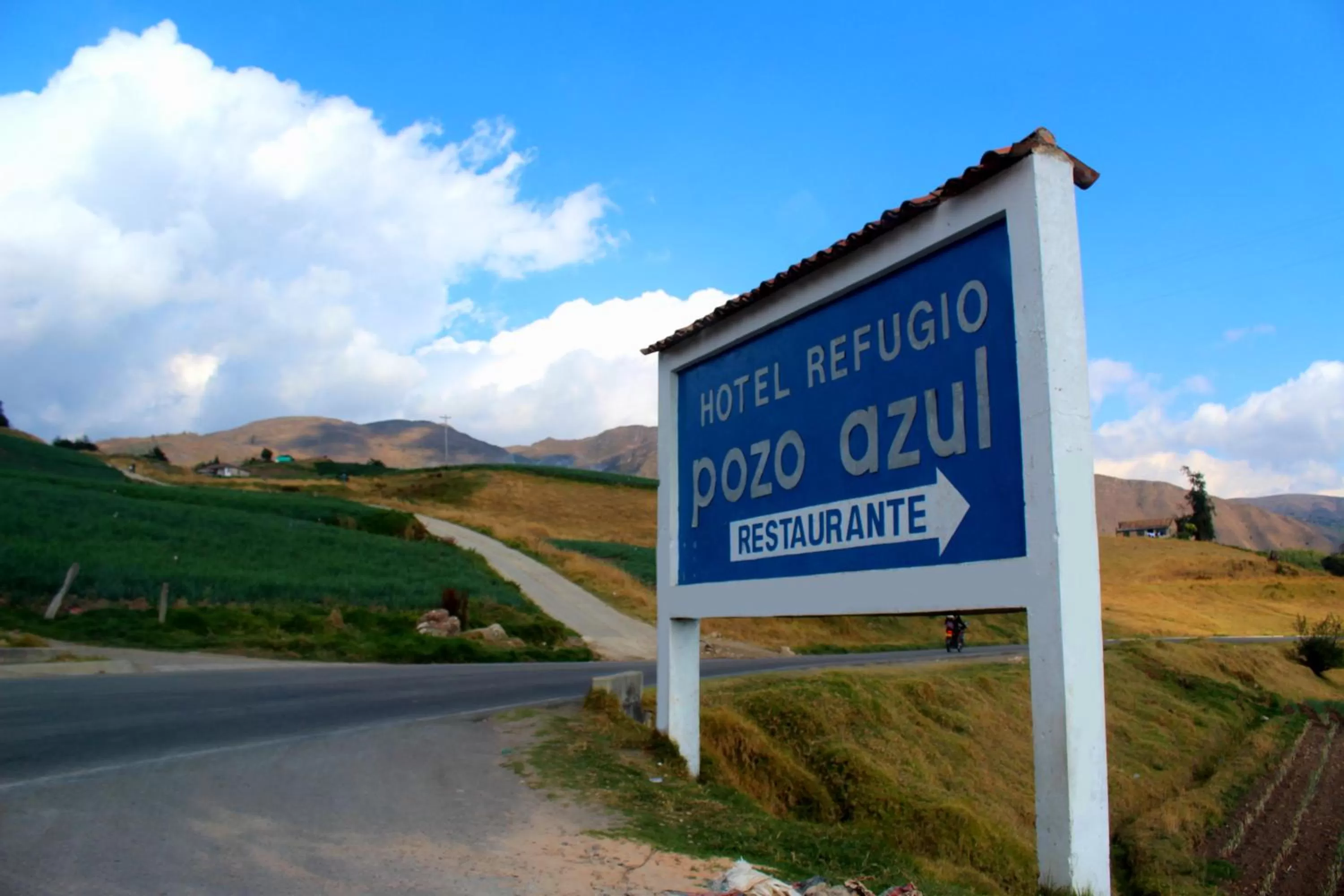 Property logo or sign in Hotel Refugio Pozo Azul