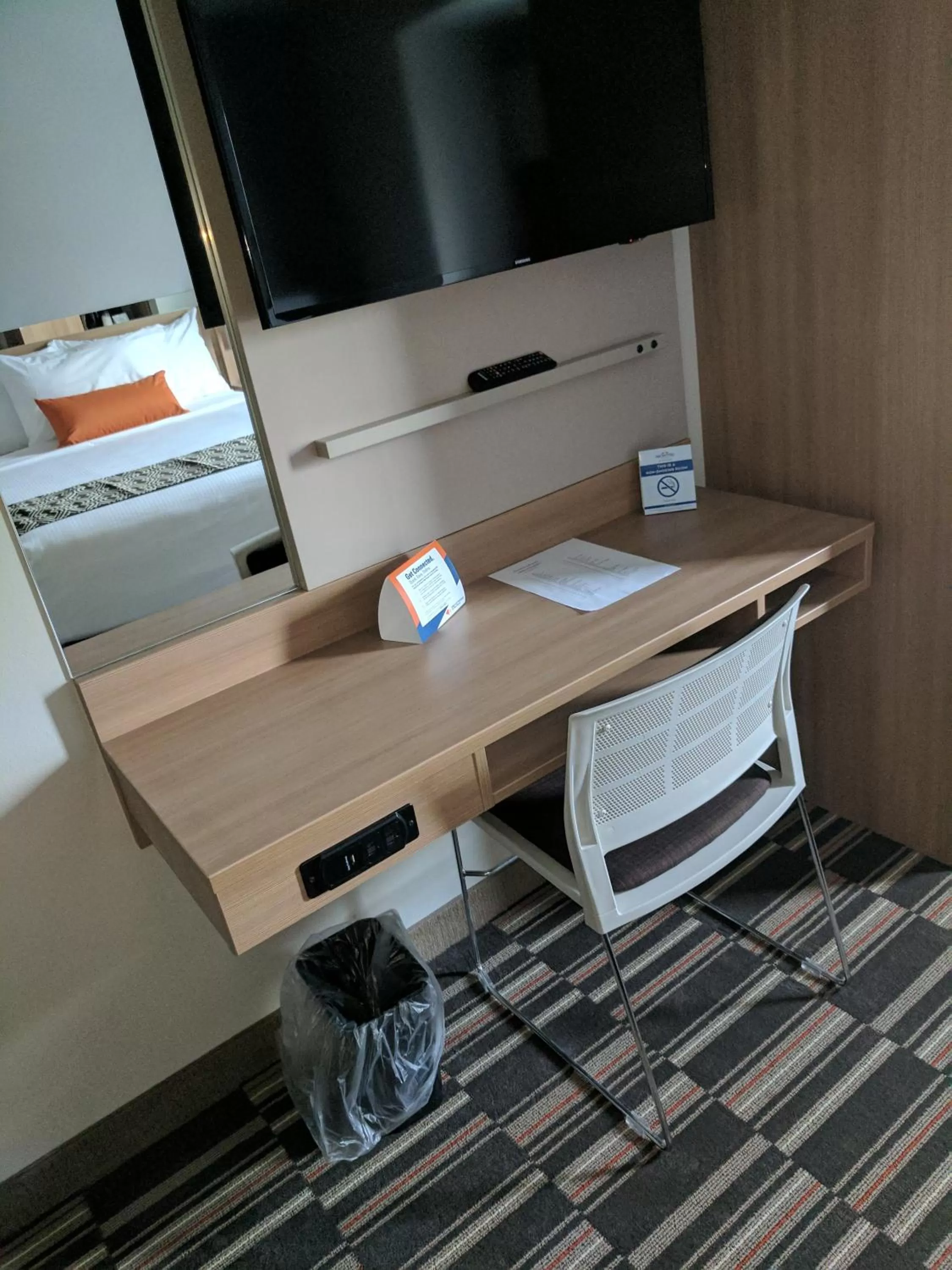 Bed in Microtel Inn & Suites by Wyndham Clarion