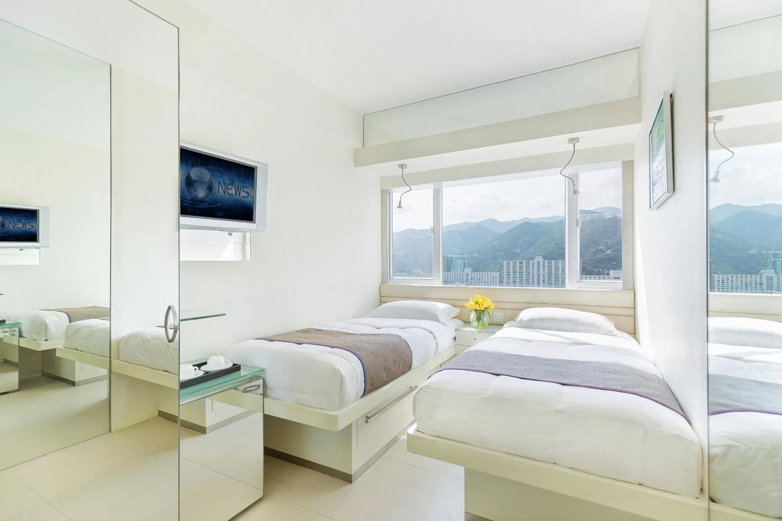 Bed in Regal Riverside Hotel