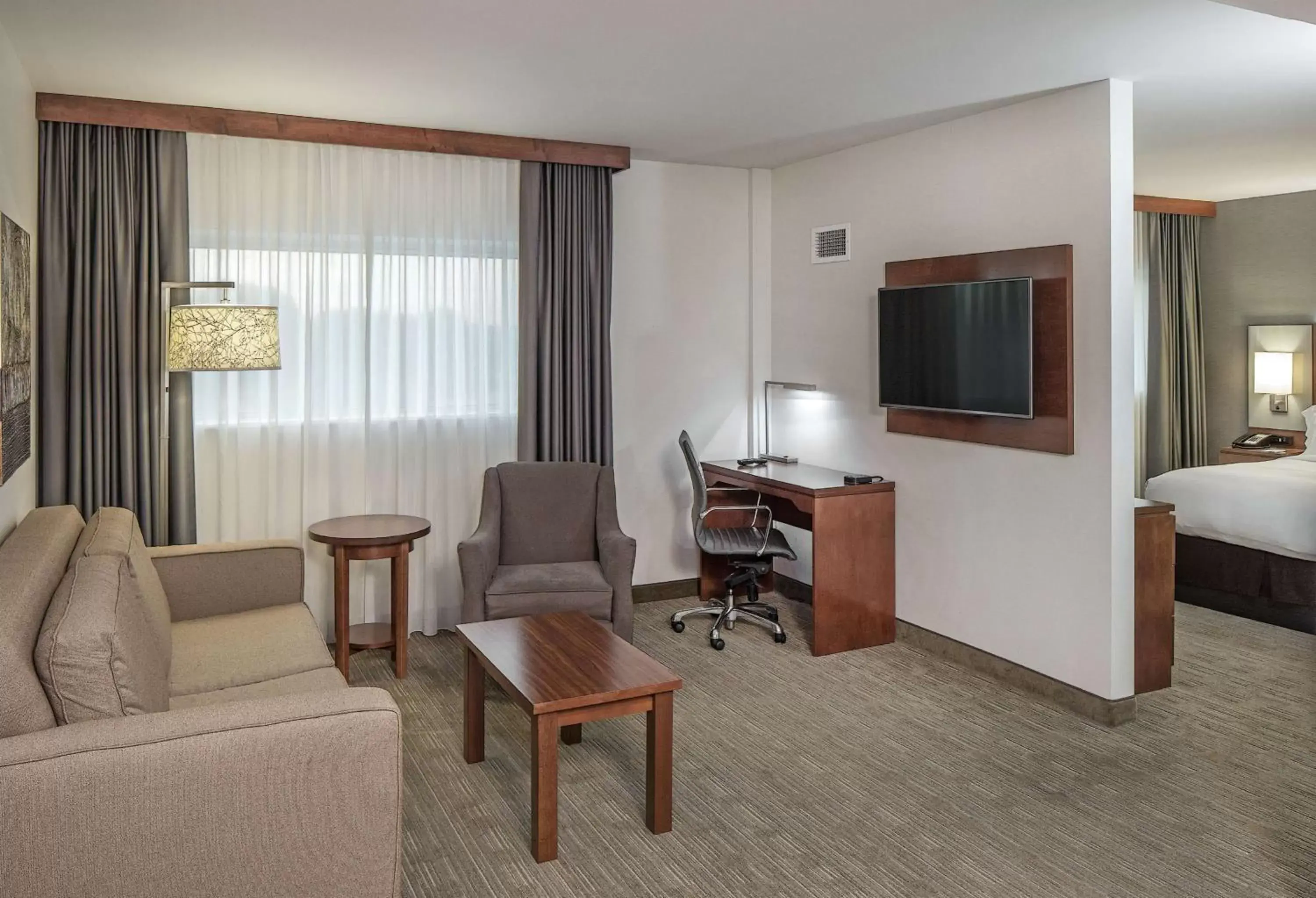 Living room, Seating Area in Doubletree By Hilton Omaha Southwest, Ne