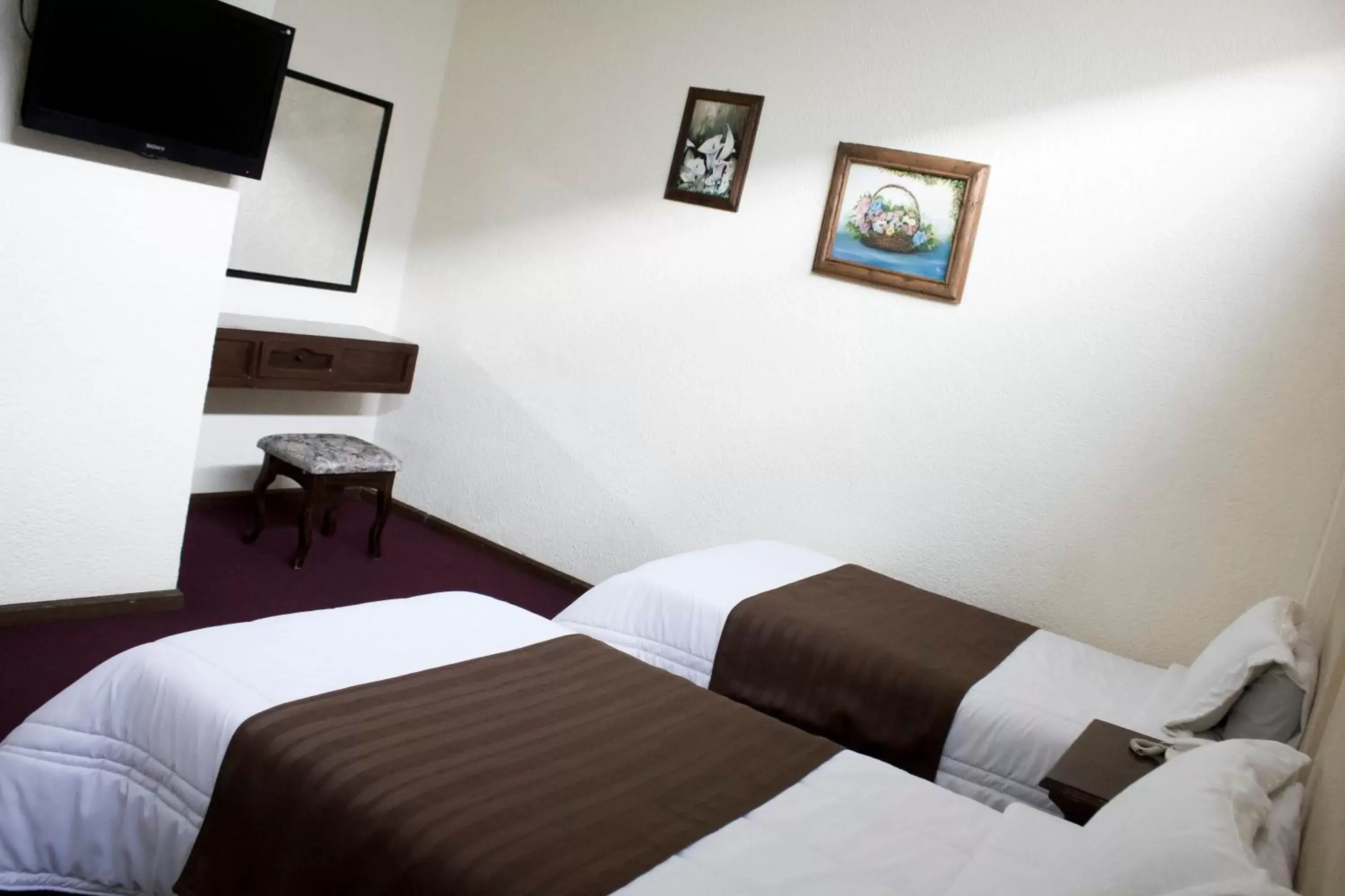 Bed in HOTEL ROMO