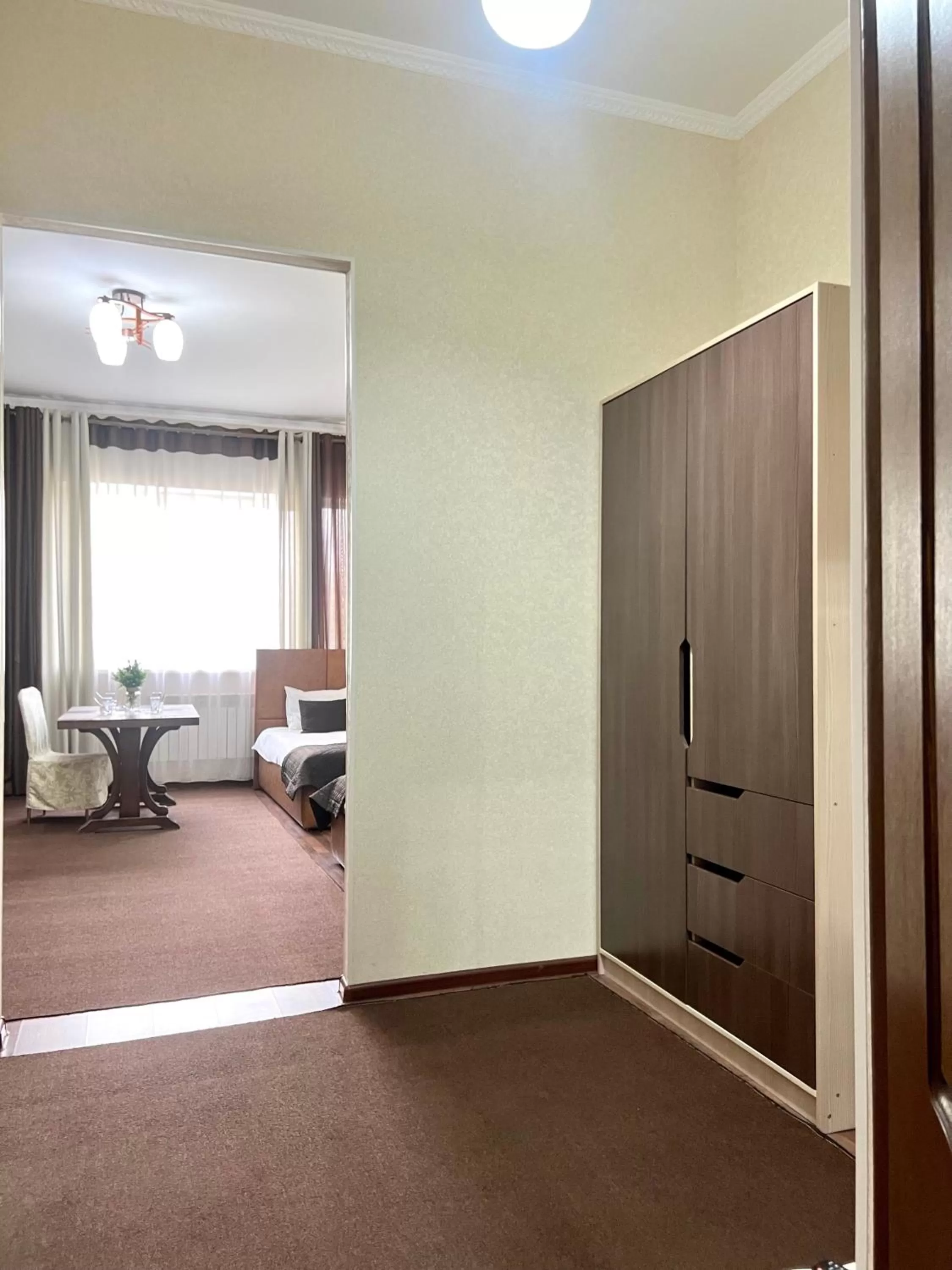 wardrobe, Bed in Caravan Hotel
