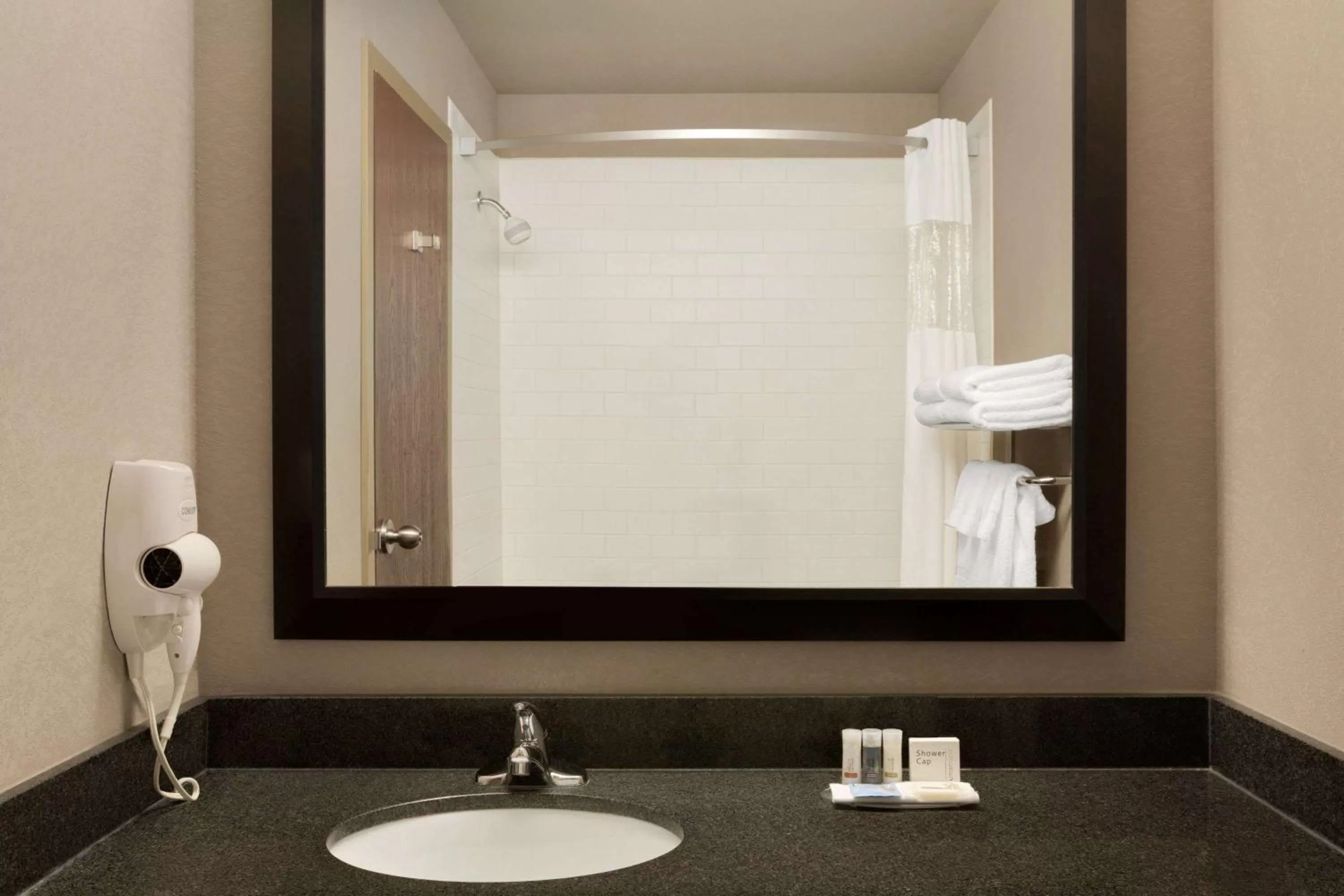 Bathroom in Days Inn by Wyndham Regina Airport West