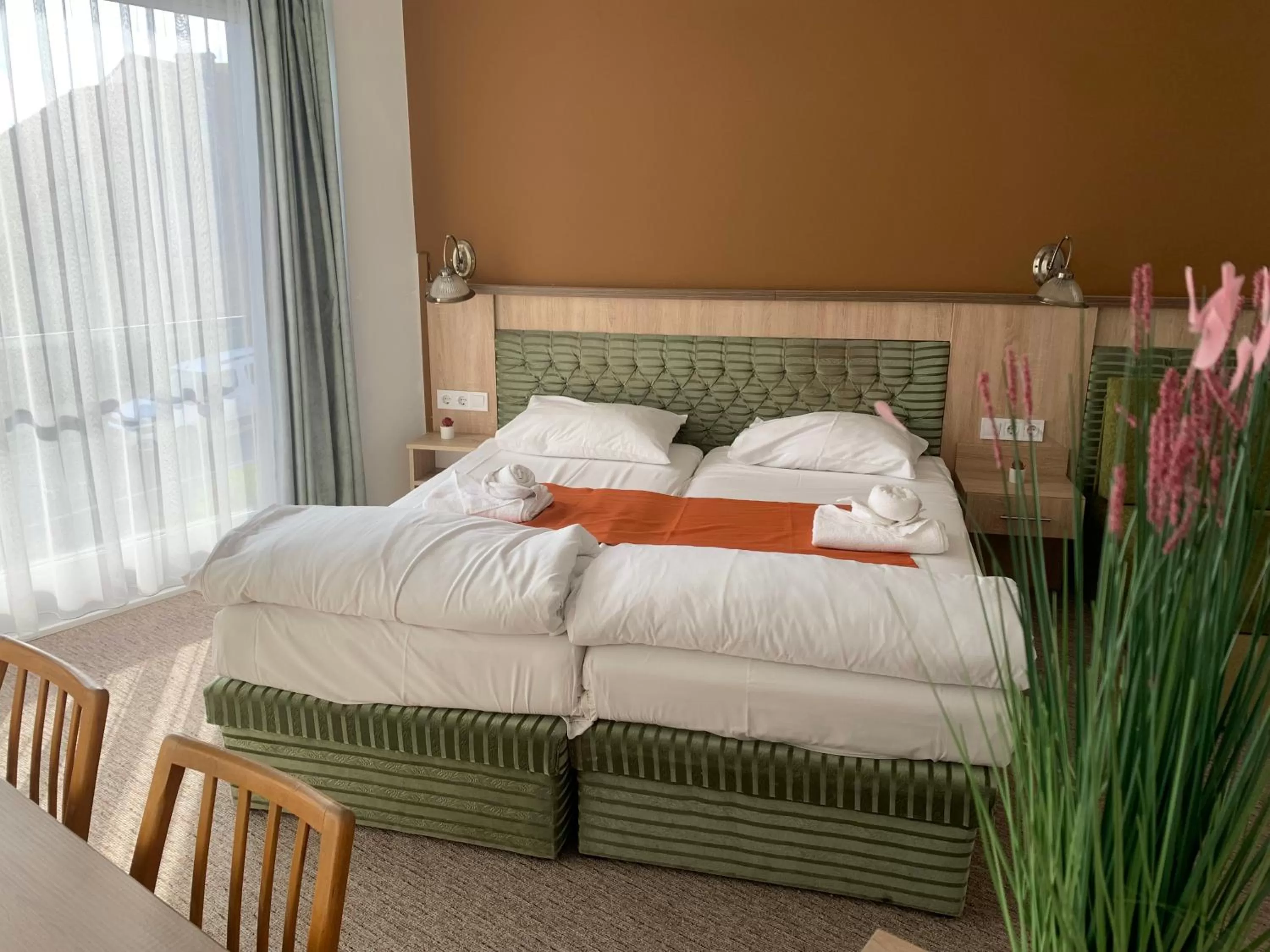 Bed in Várfal Wellness Panzió