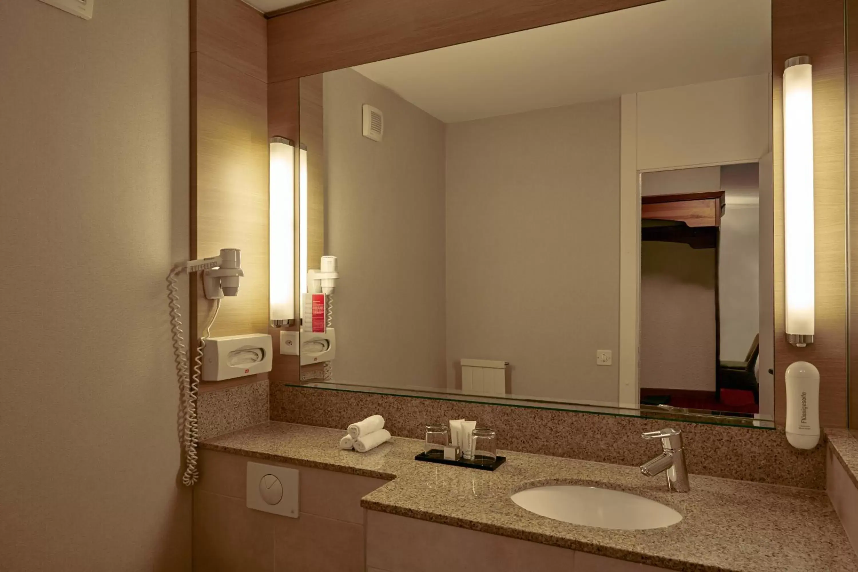 Photo of the whole room, Bathroom in H+ Hotel & SPA Engelberg