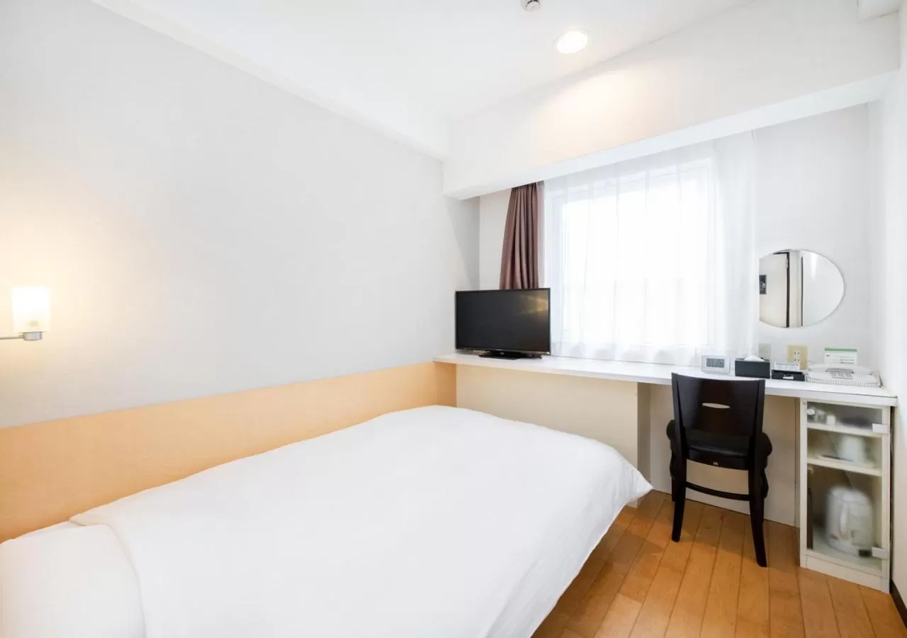 Bed in TKP Sunlife Hotel