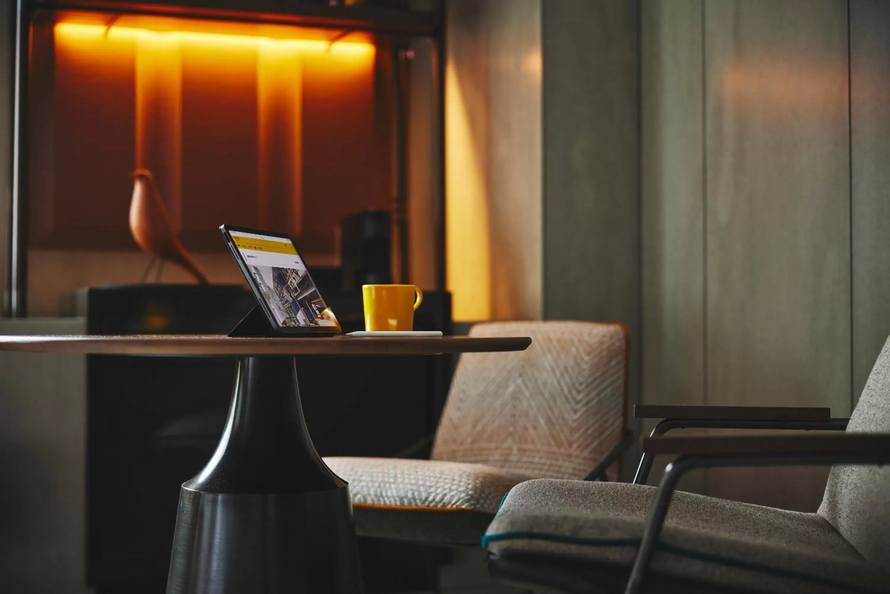 Seating area in voco Osaka Central, an IHG Hotel