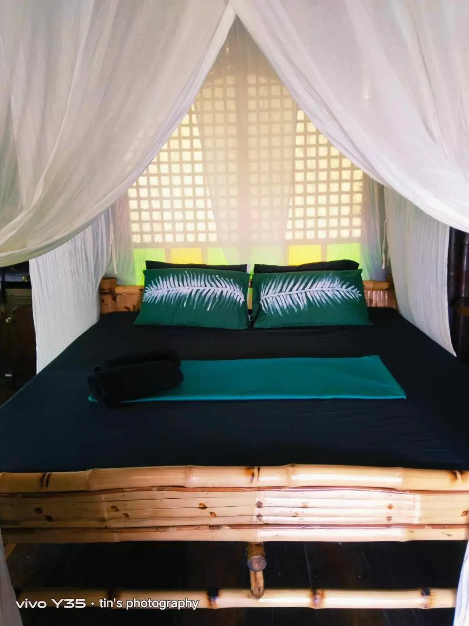 Bed in Sanctuaria Treehouses Busuanga