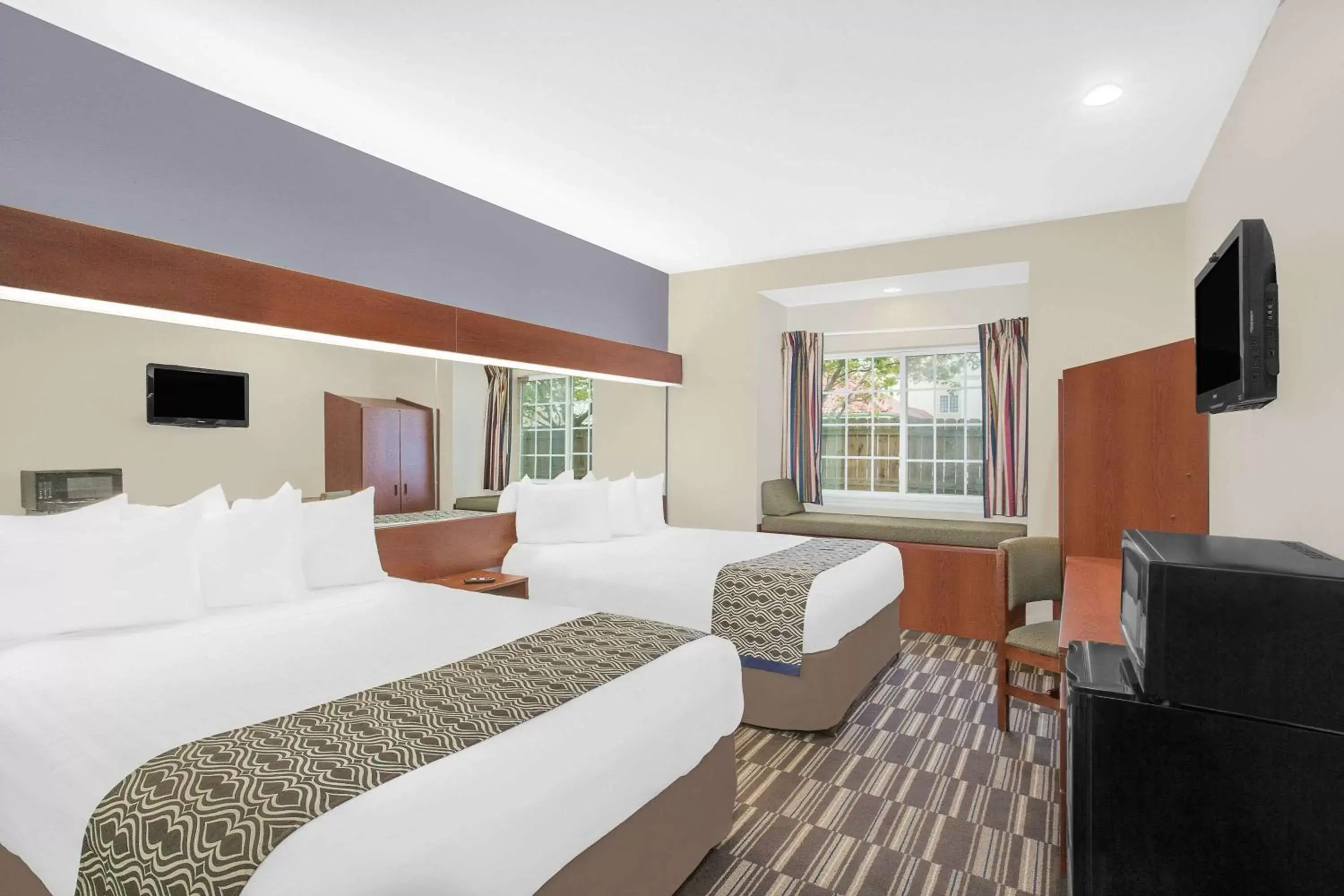 Photo of the whole room, Bed in Microtel by Wyndham Bentonville