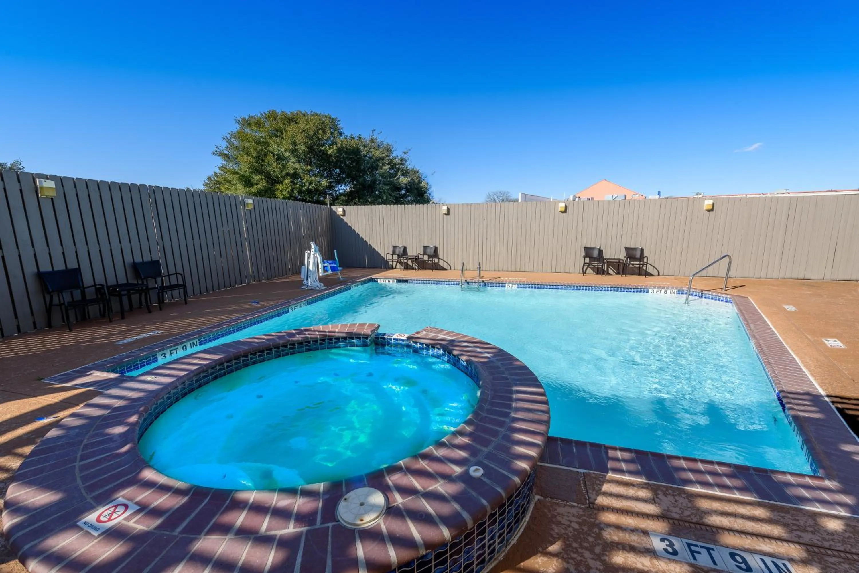 Swimming pool in Holiday Inn Express Hotel and Suites Bastrop by IHG