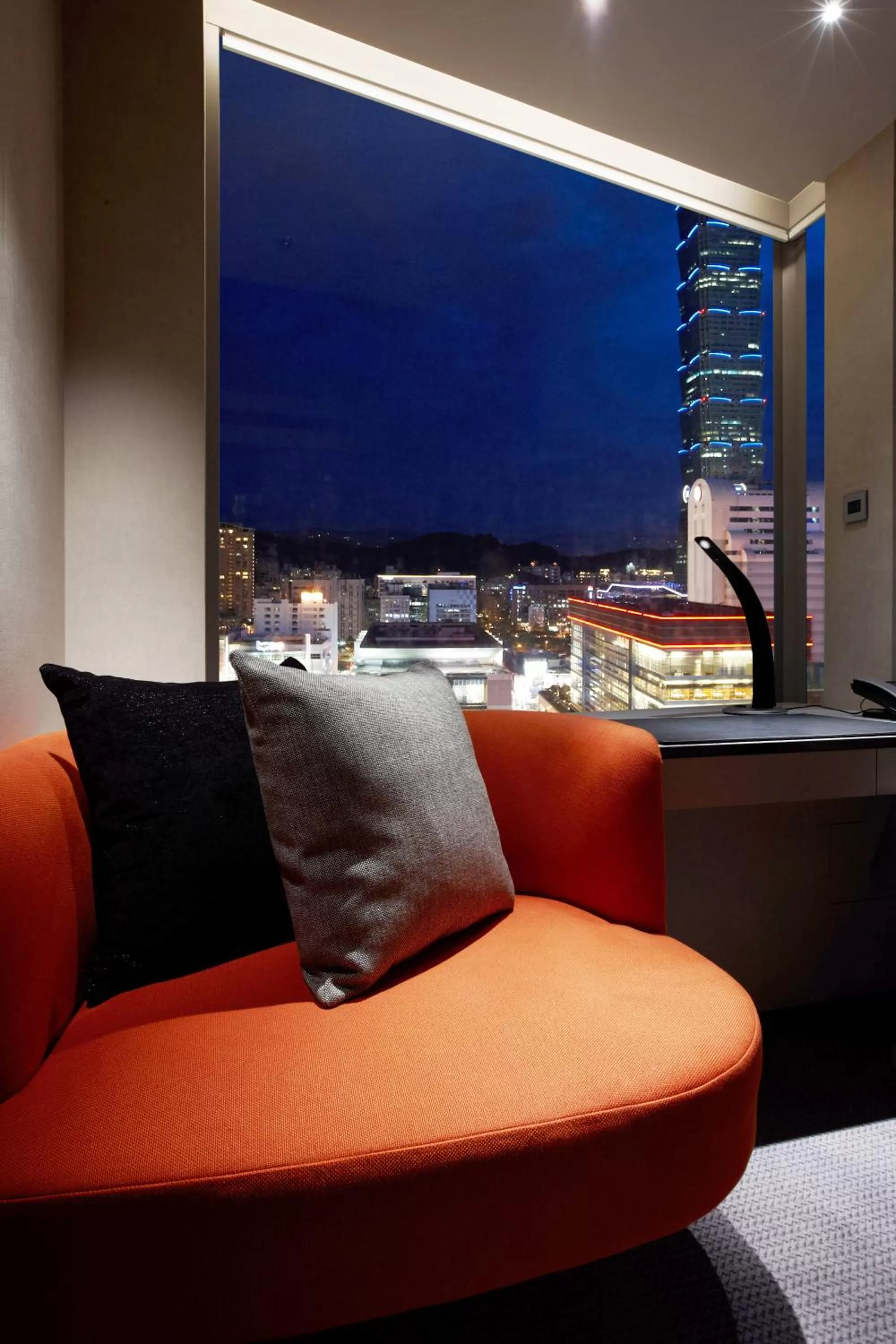 Seating area in Humble House Taipei, Curio Collection by Hilton