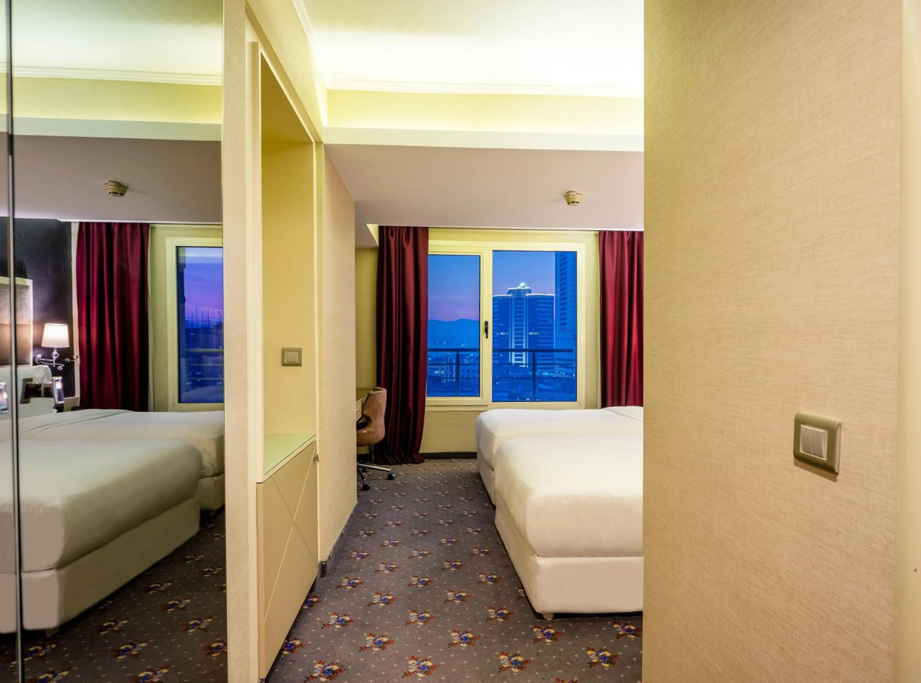 Seating area, Bed in DoubleTree by Hilton Izmir - Alsancak