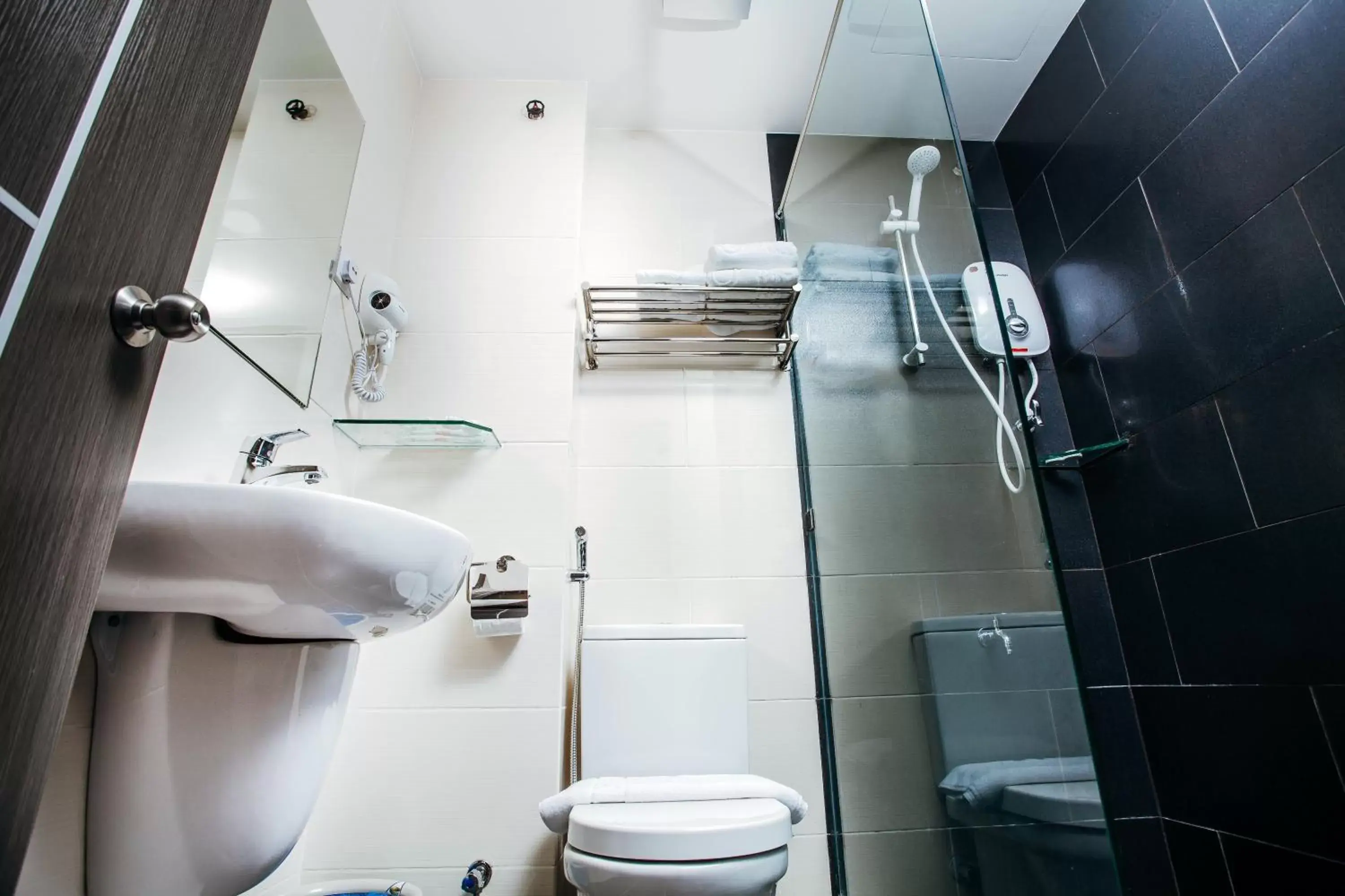 Toilet in Friendly Hotel Toilet in Friendly Hotel