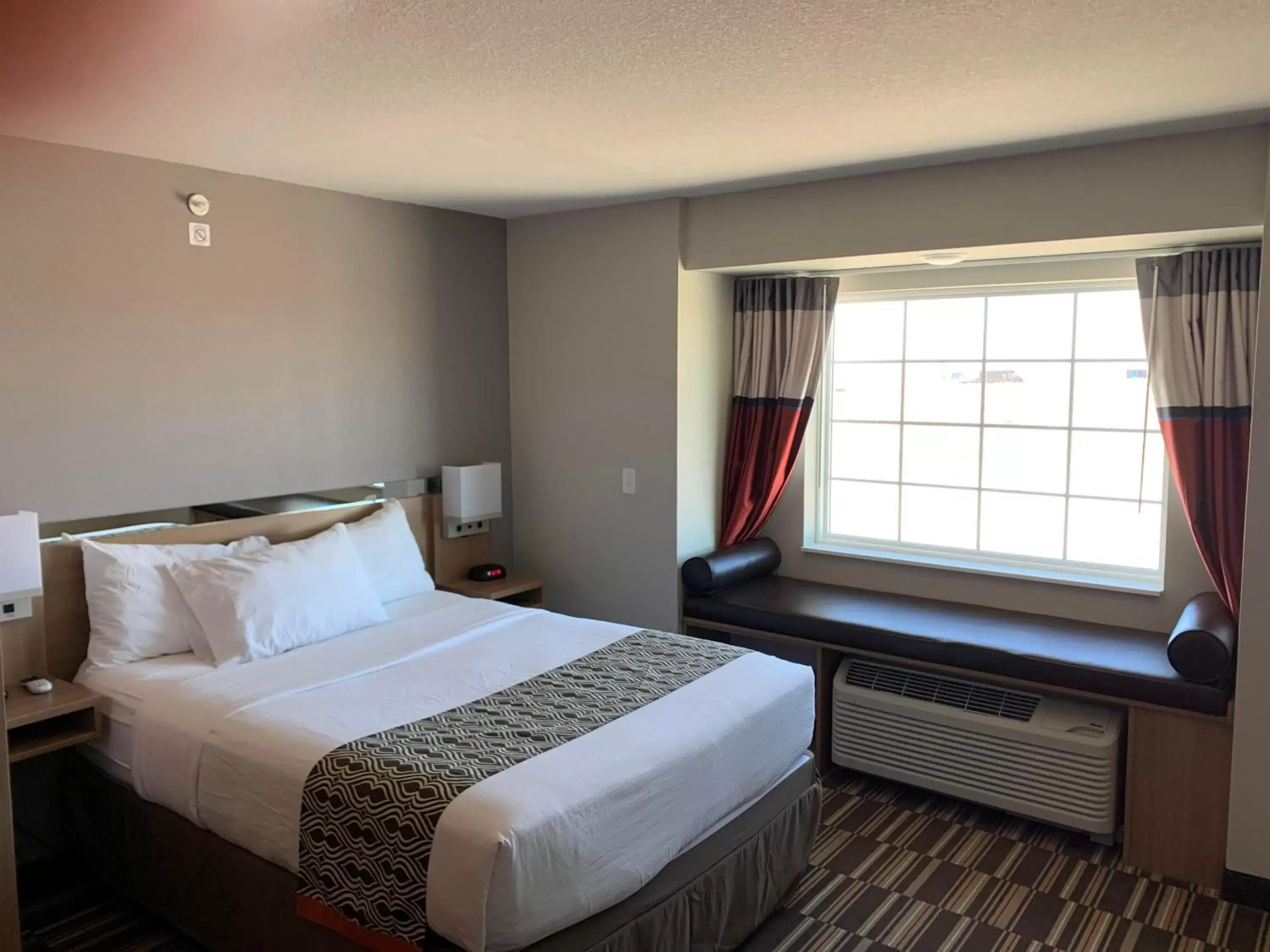 Bed in Microtel Inn & Suites by Wyndham Limon