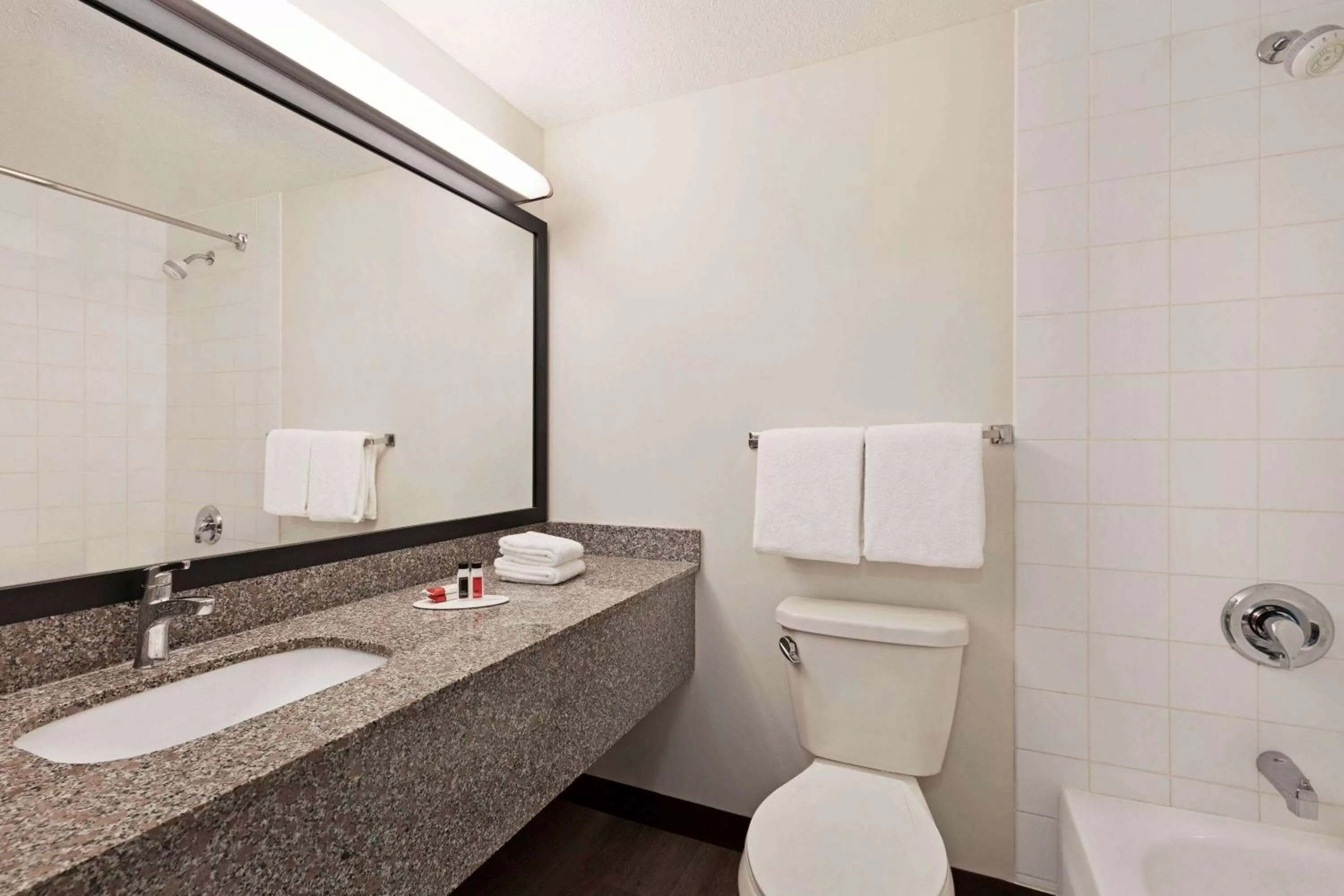 Bathroom in Super 8 by Wyndham Calgary Shawnessy Area