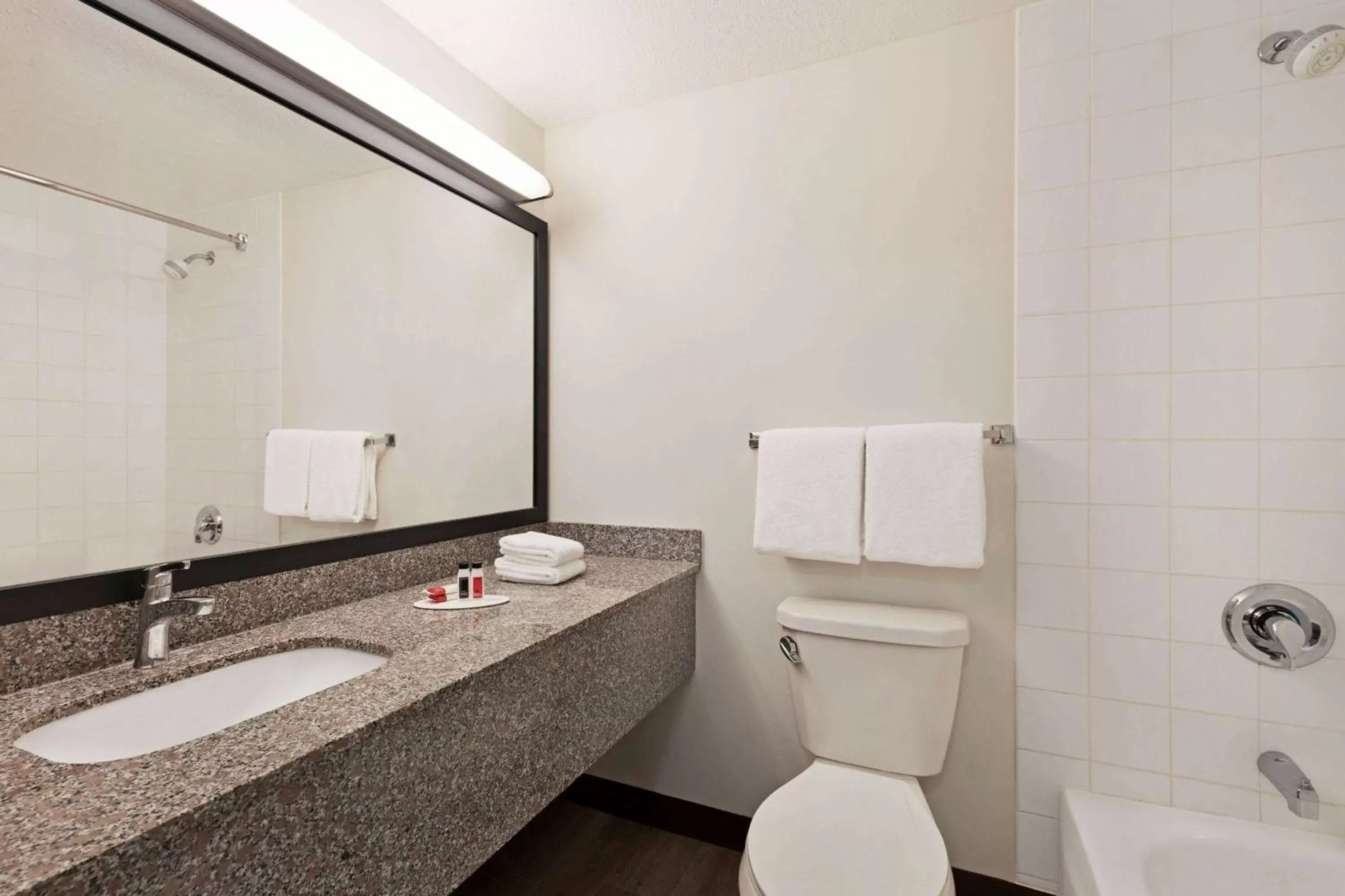 TV and multimedia, Bathroom in Super 8 by Wyndham Calgary Shawnessy Area