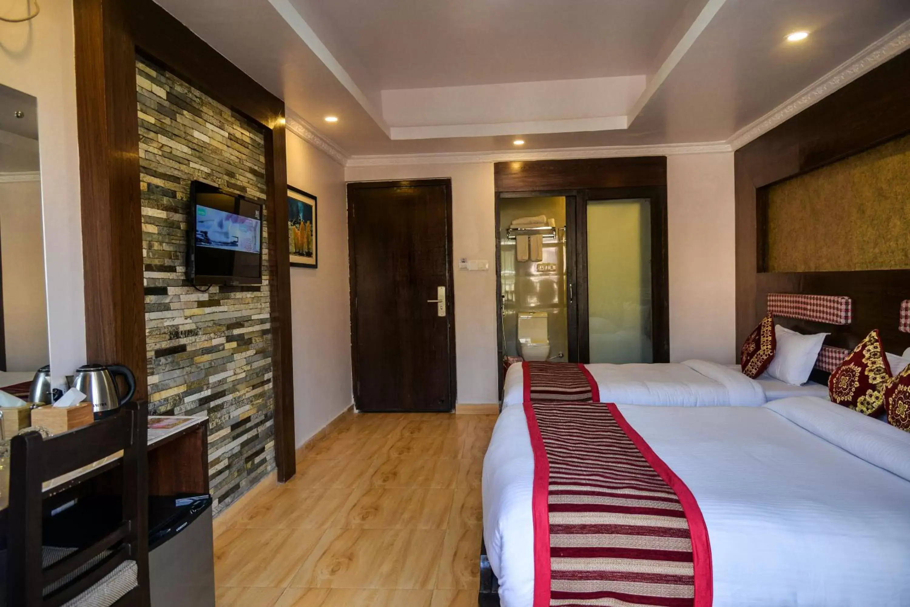 Communal lounge/ TV room, TV/Entertainment Center in Kuti Resort & Spa