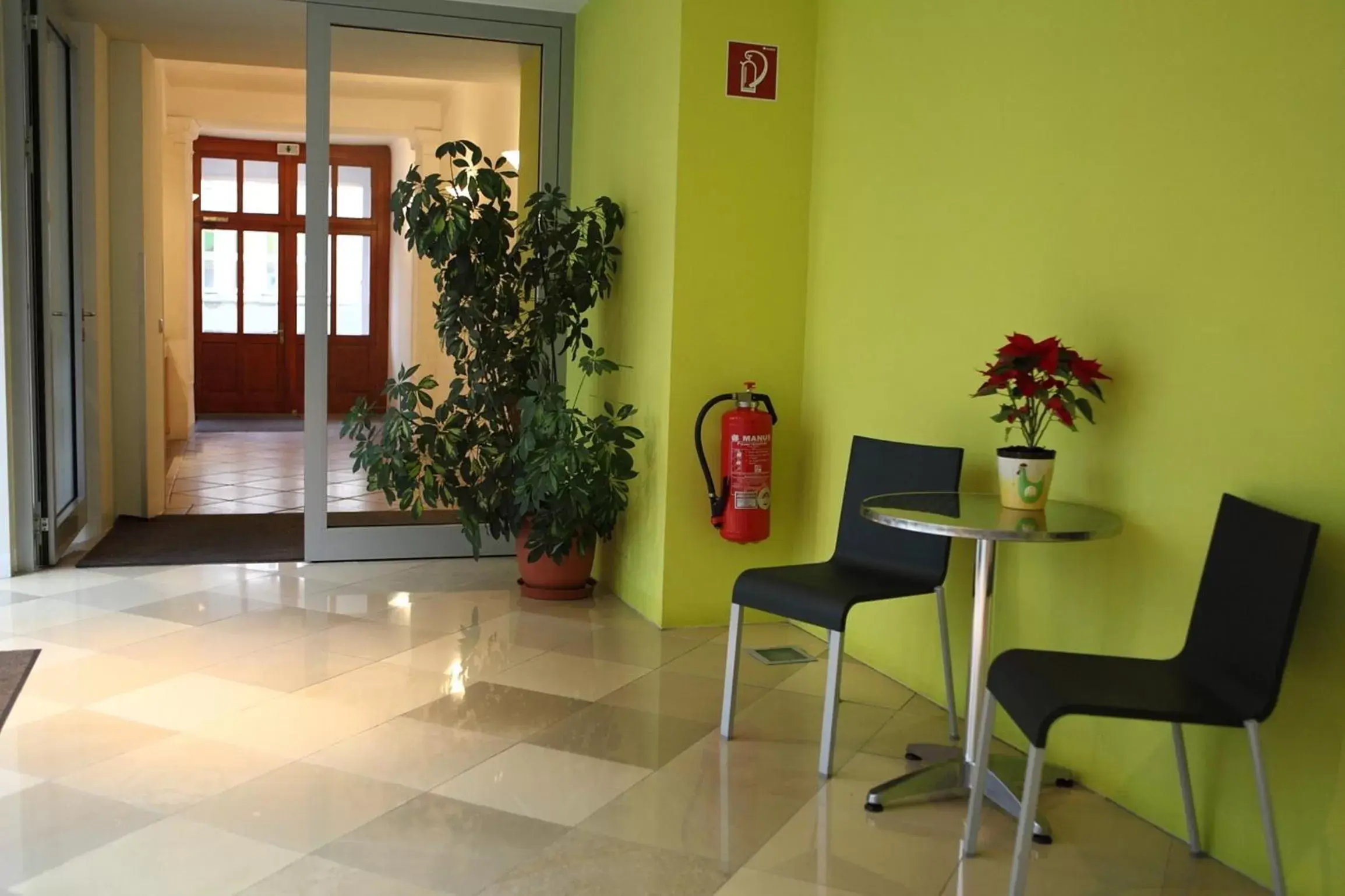 Lobby or reception in Hotel Caroline Lobby or reception in Hotel Caroline