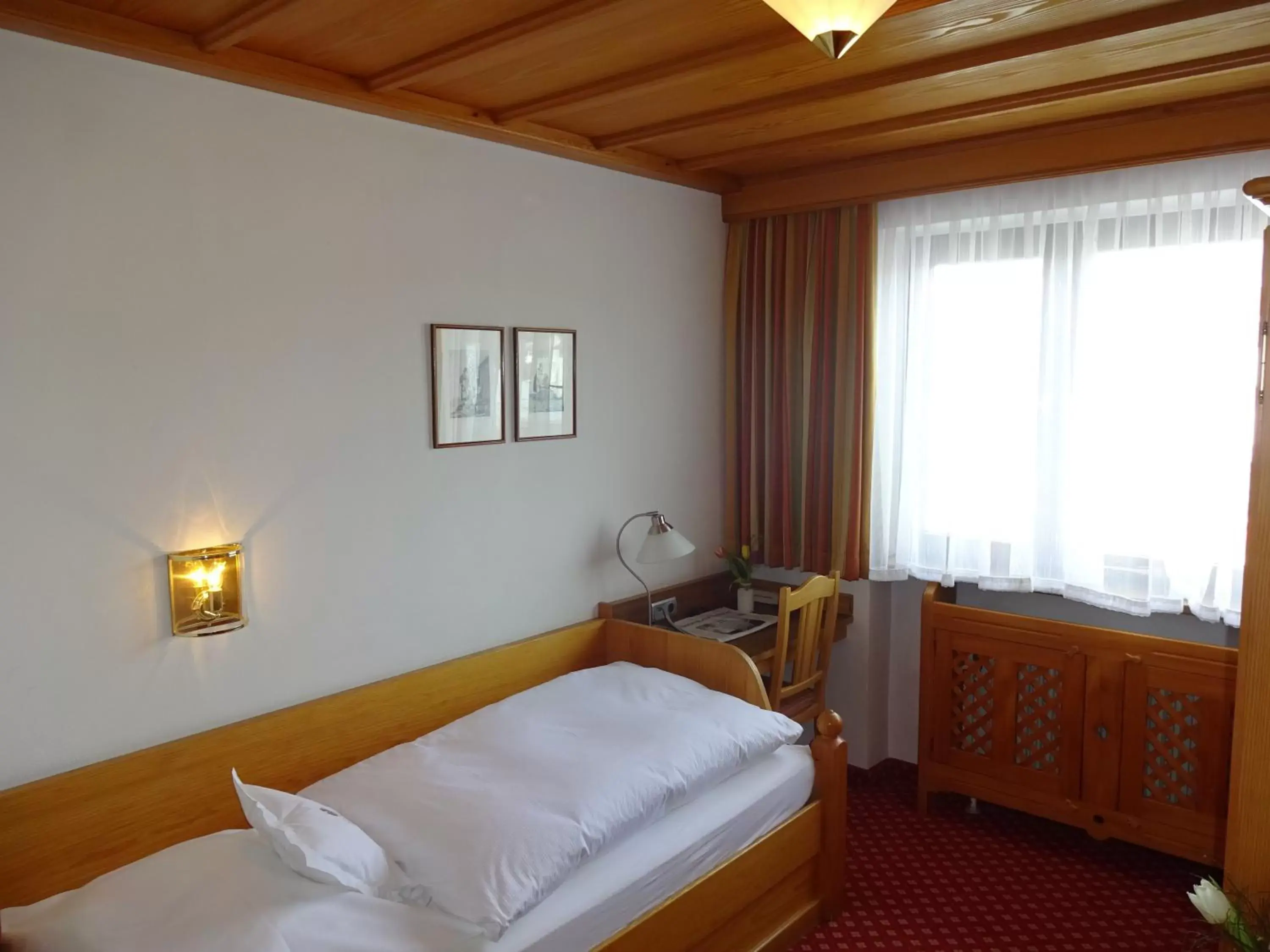 Photo of the whole room, Bed in Hotel Neuwirt