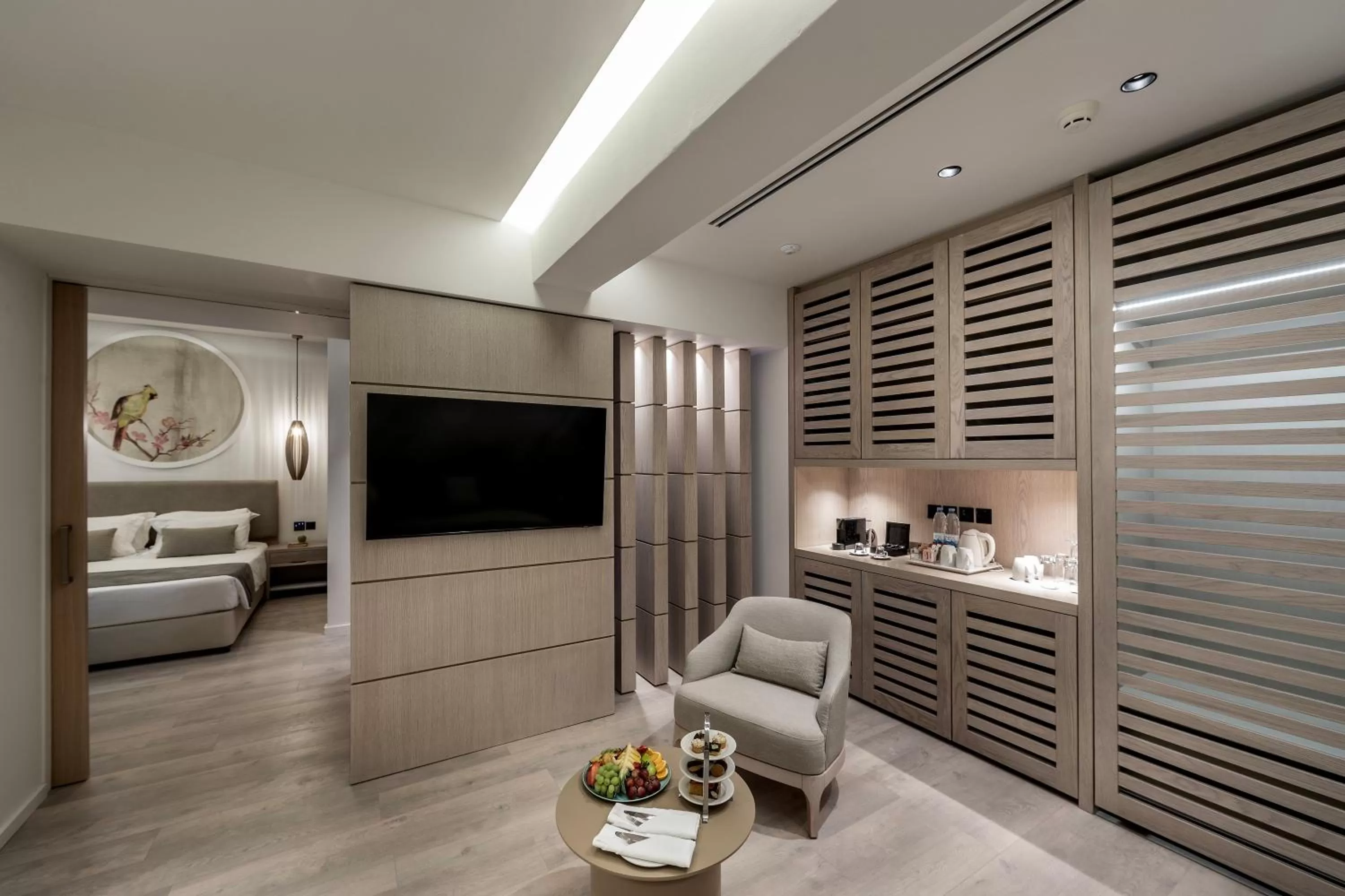 Seating area, Bed in NissiBlu Beach Resort