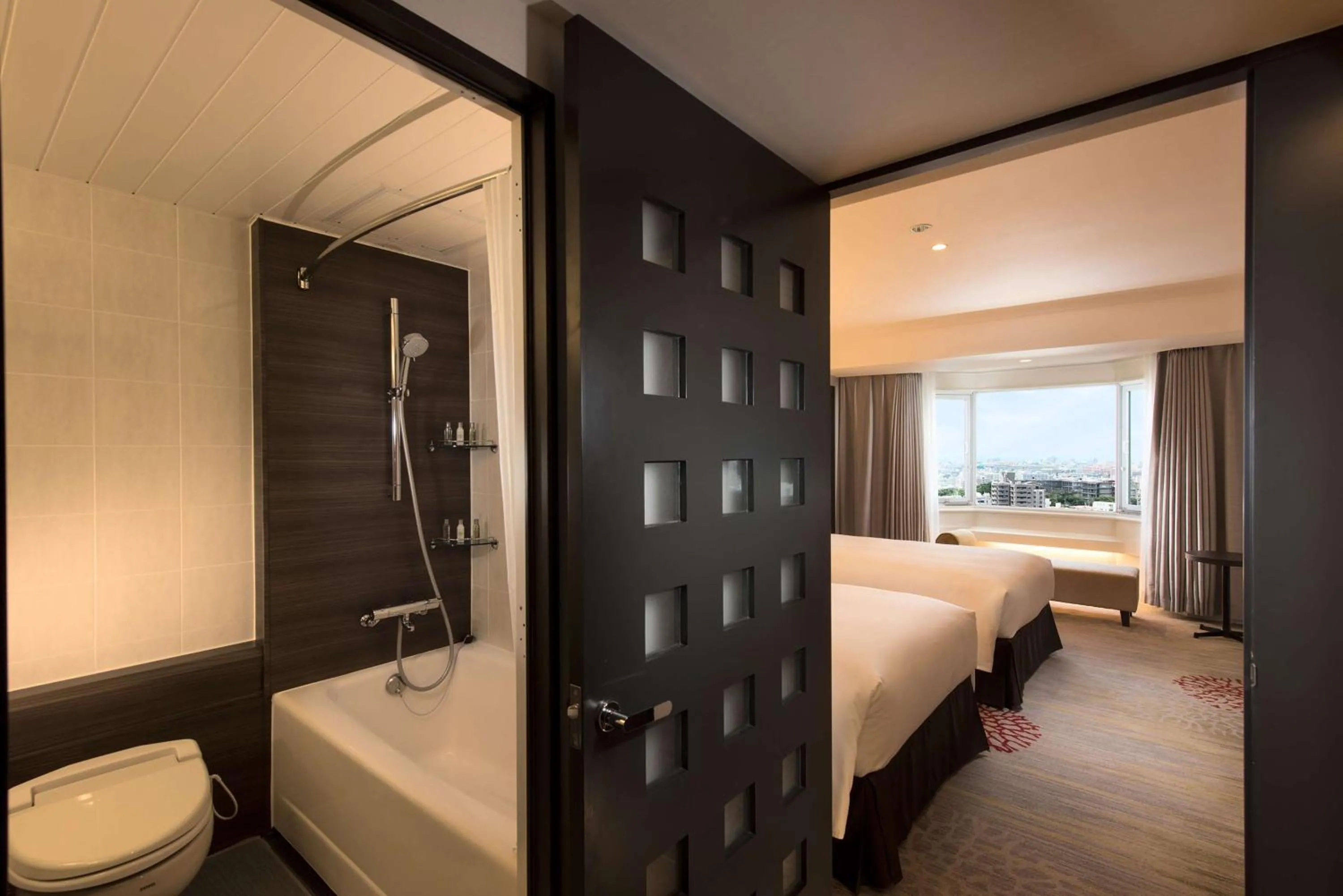 Bathroom, Bed in DoubleTree by Hilton Naha Shuri Castle