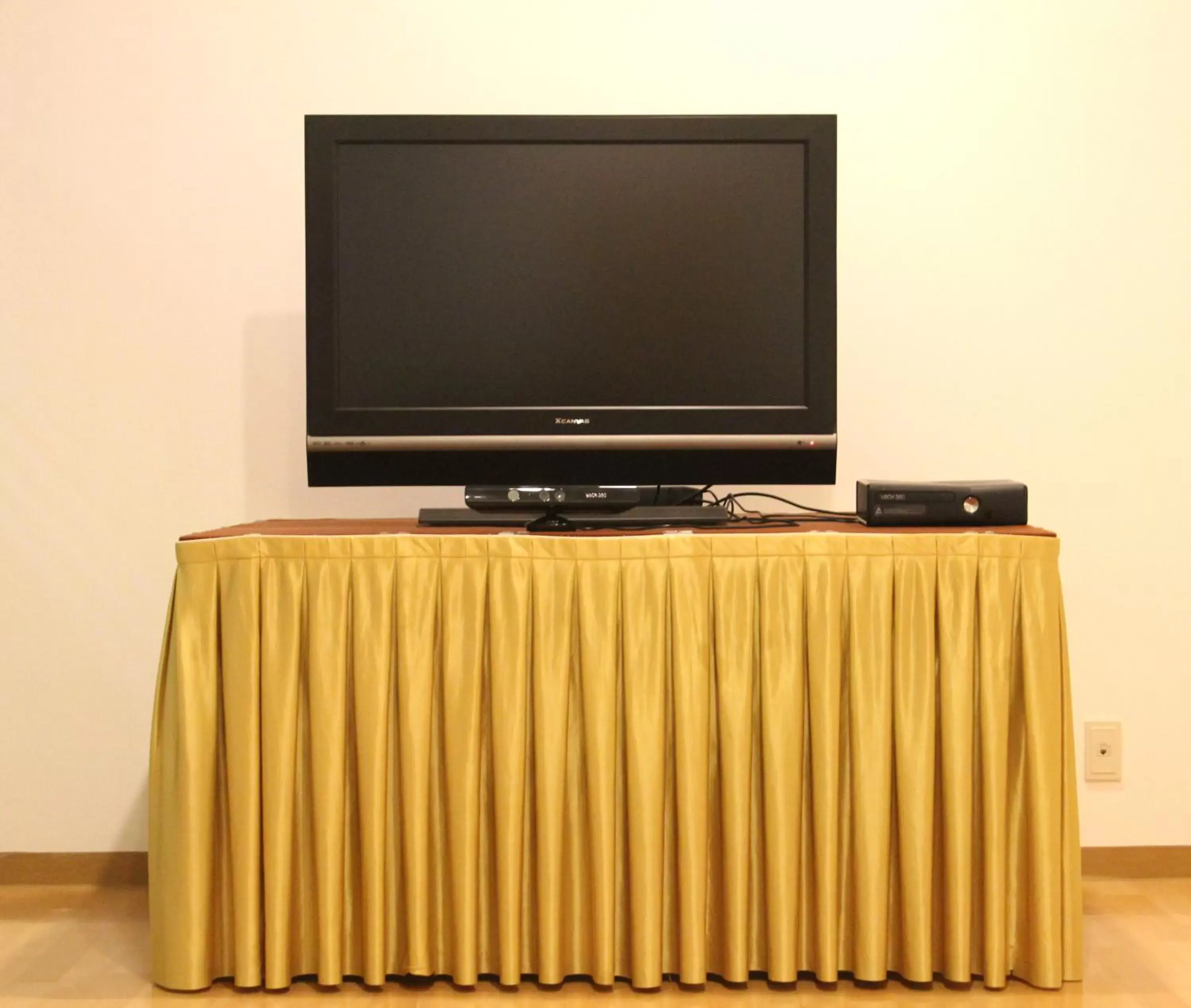 TV and multimedia, TV/Entertainment Center in Hotel Hyundai by Lahan Mokpo