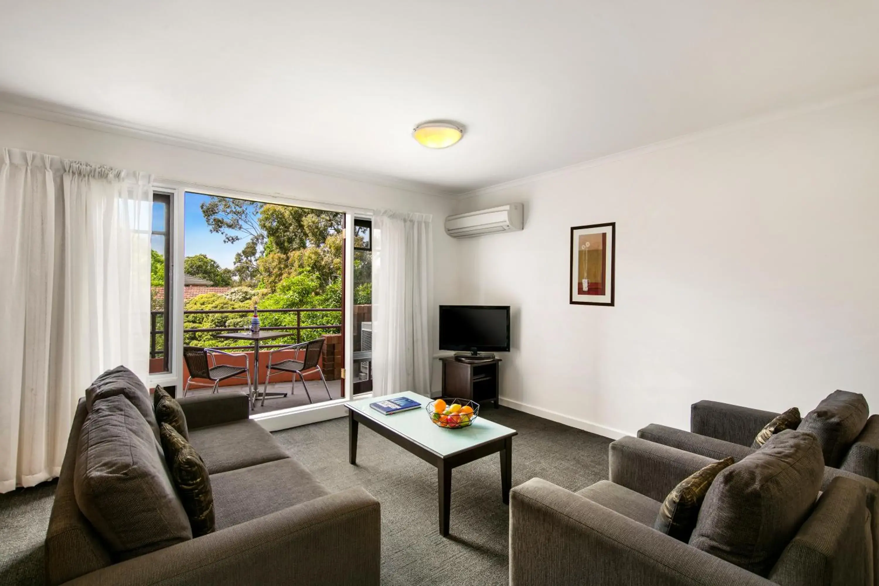 Seating Area in Comfort Apartments Royal Gardens