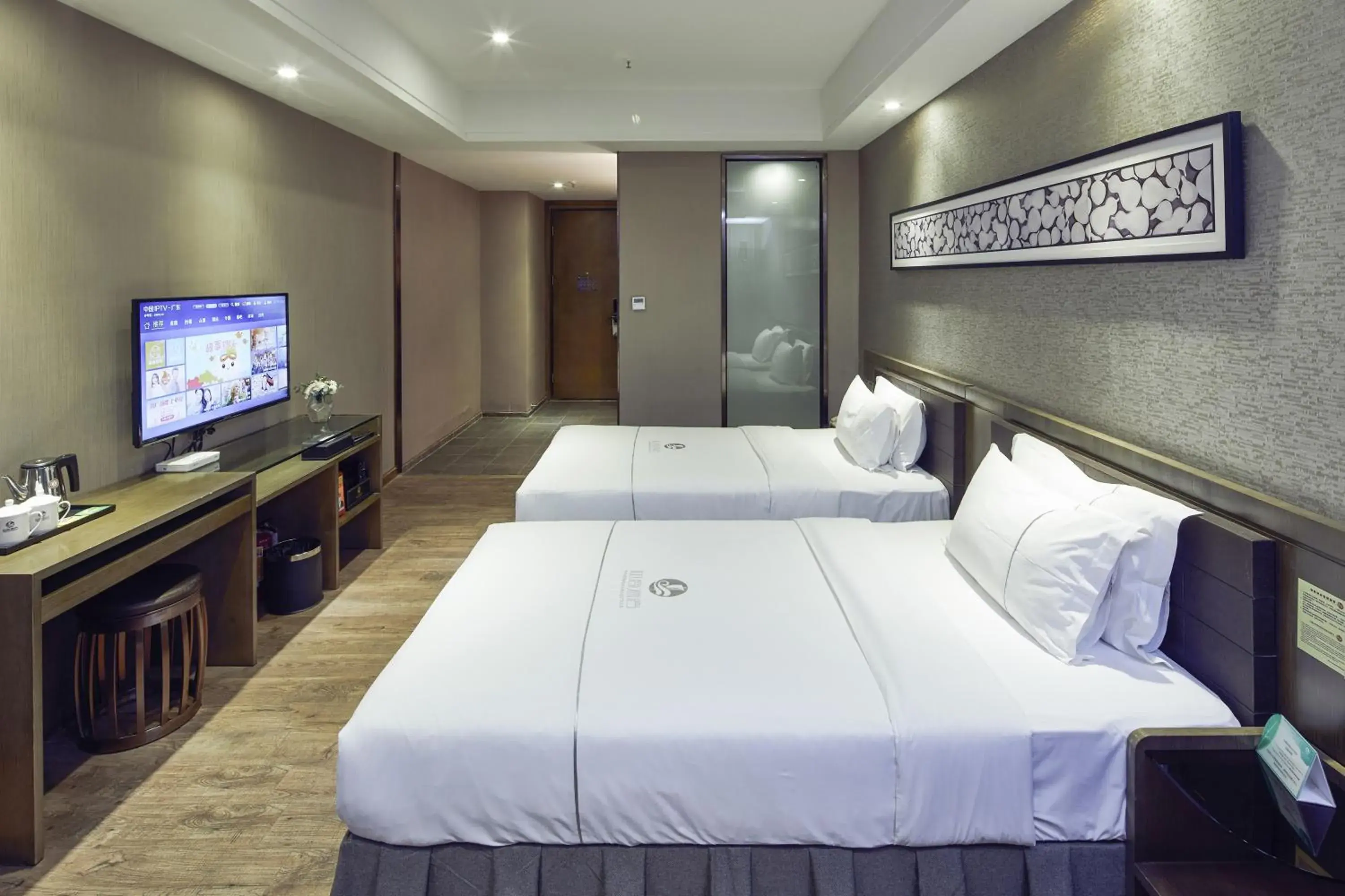 Bed in INSAIL Hotel (Shenzhen Dongmen Branch)