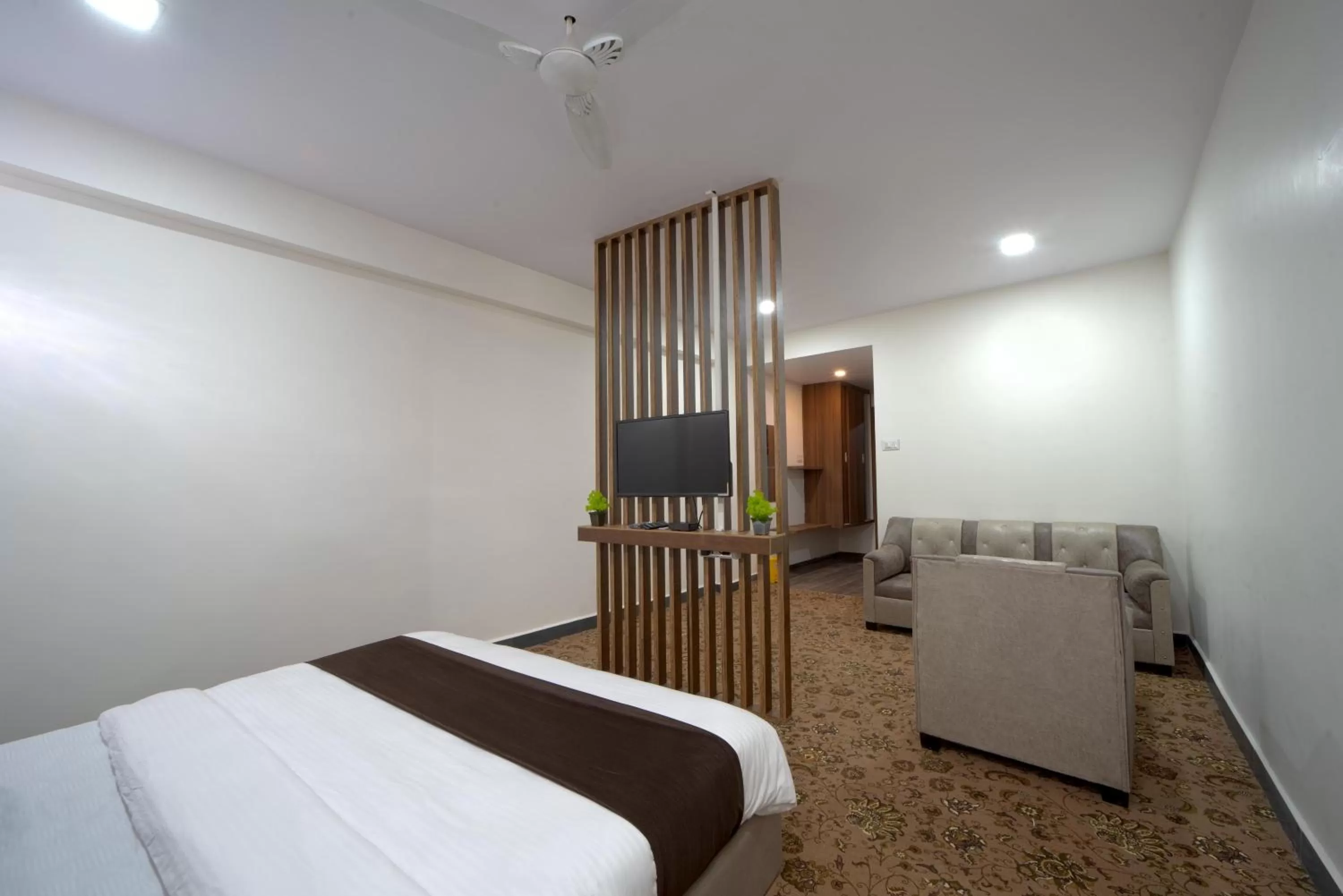 Photo of the whole room, Bed in Hotel Jurkis, Kolhapur