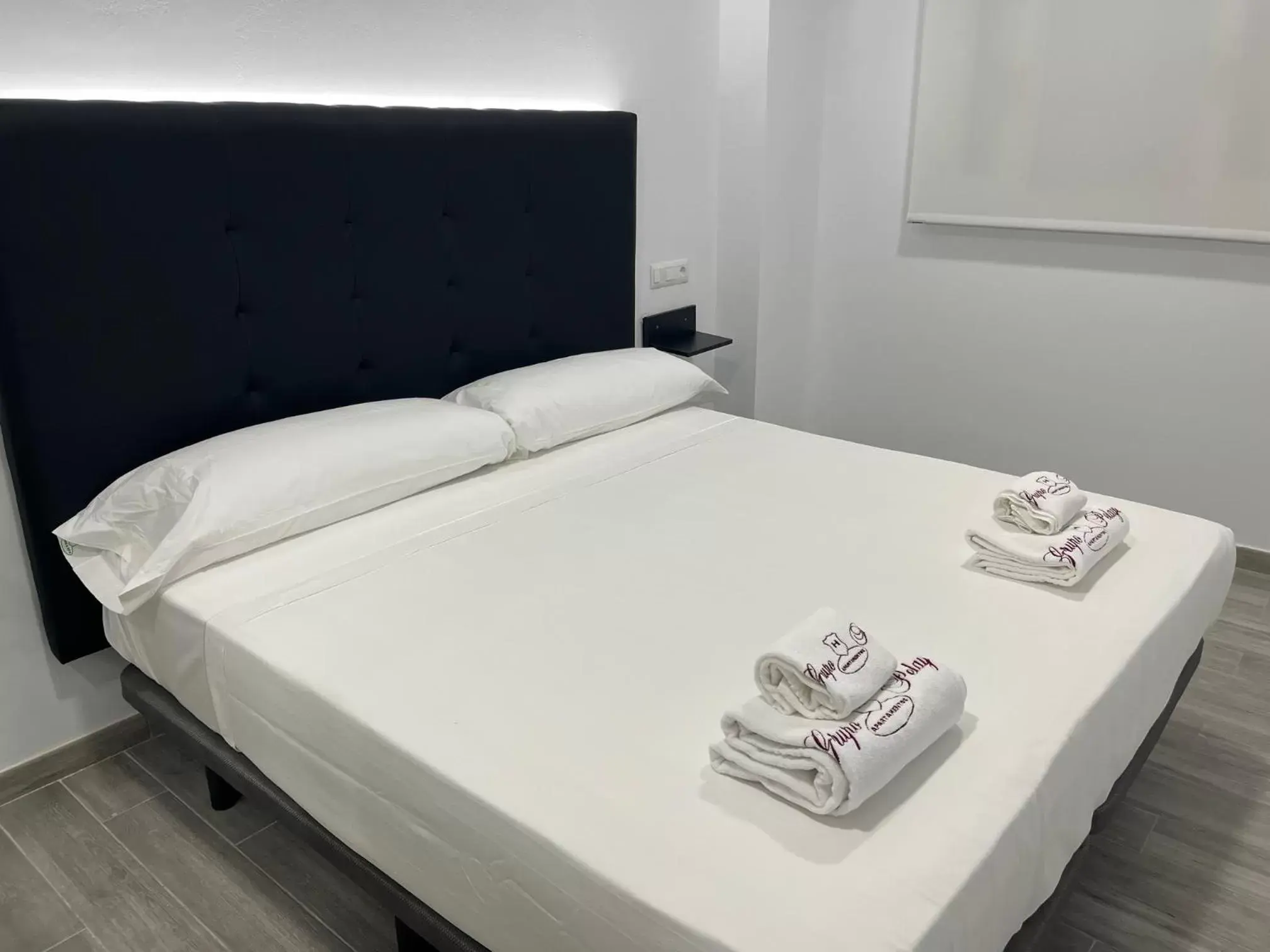 Bed in H Pelayo Auto Check-In Rooms