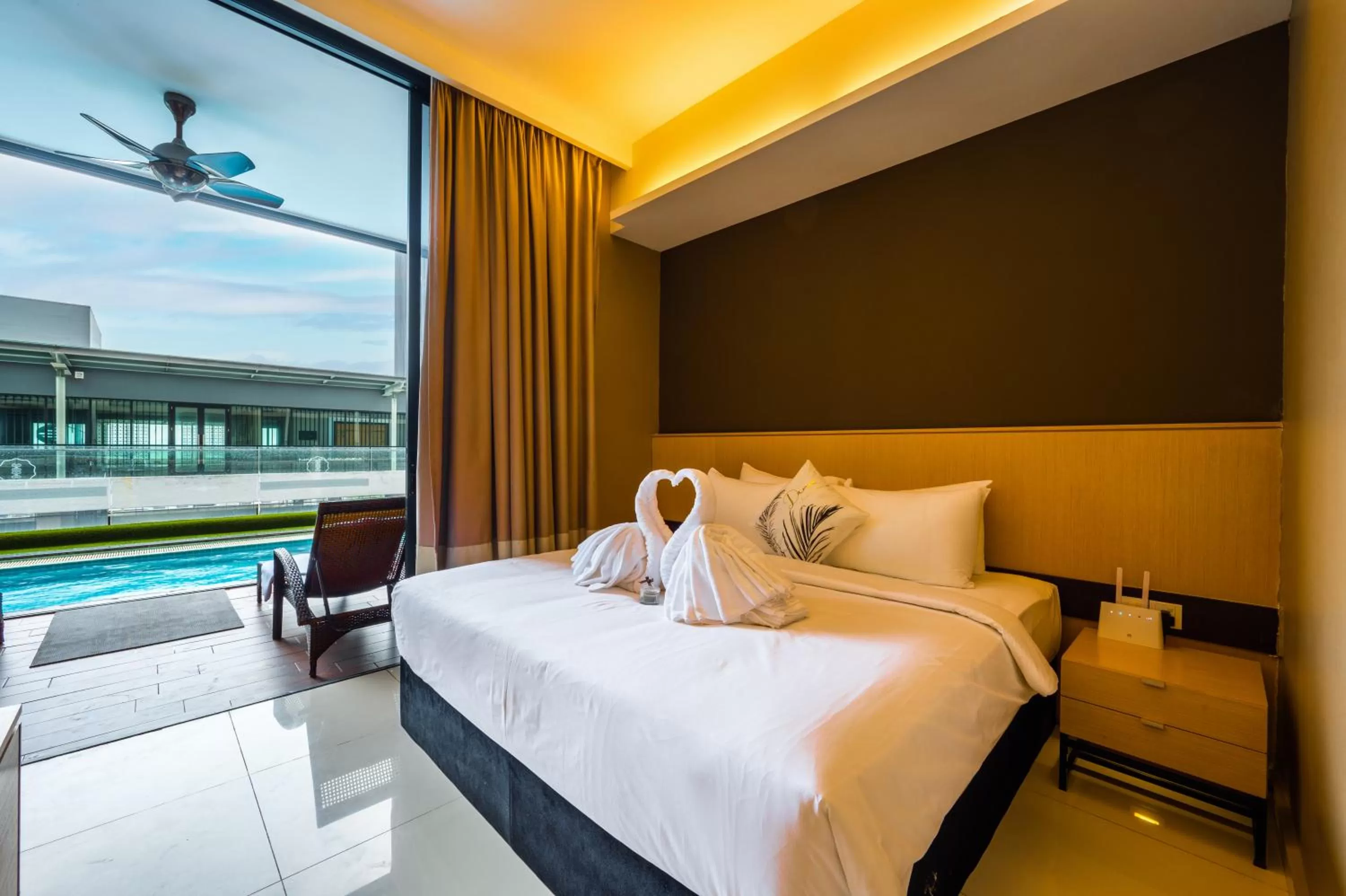 Bed in Greystone 99 Suites