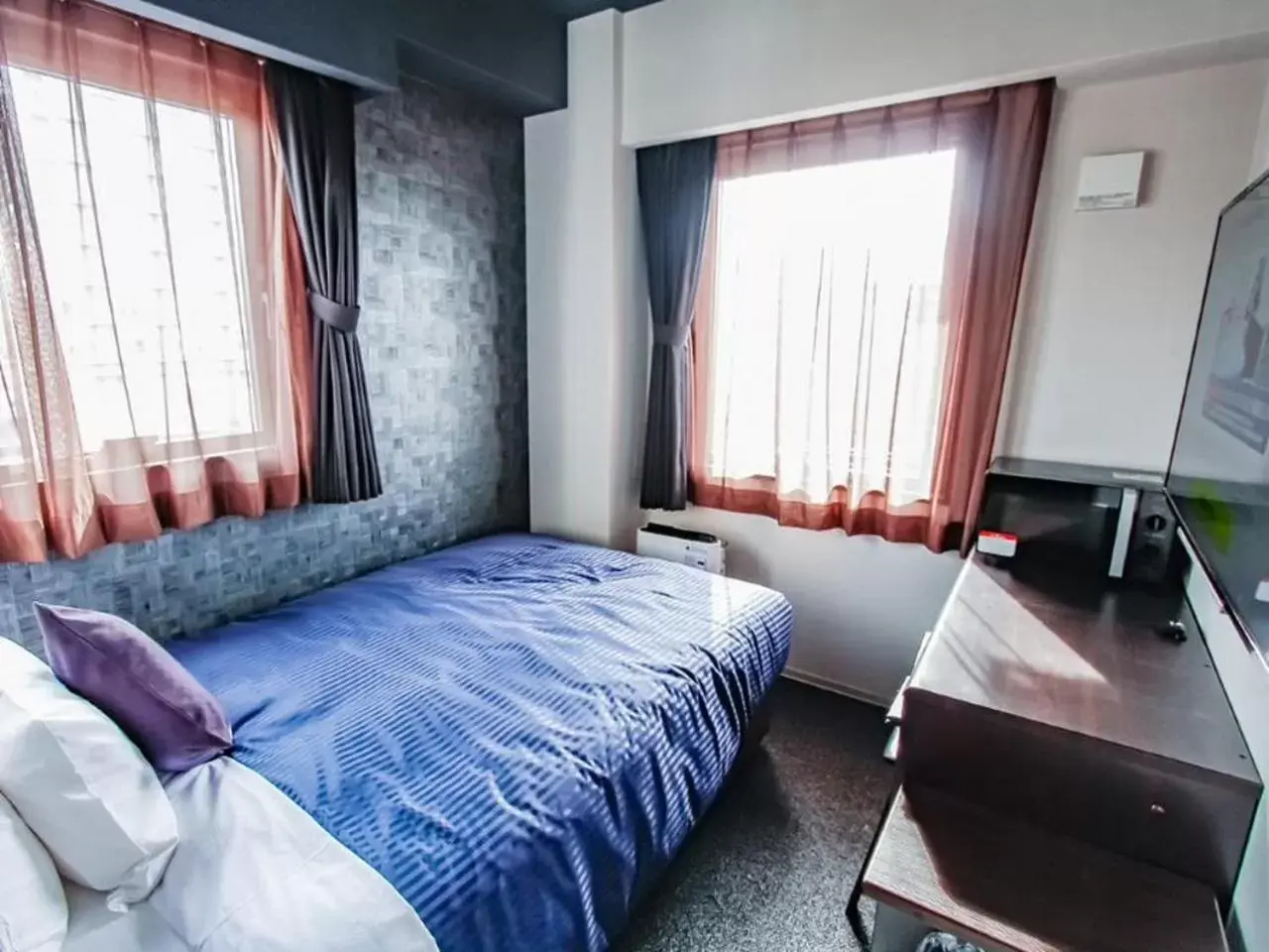 Bed in HOTEL LiVEMAX PREMIUM Umeda EAST