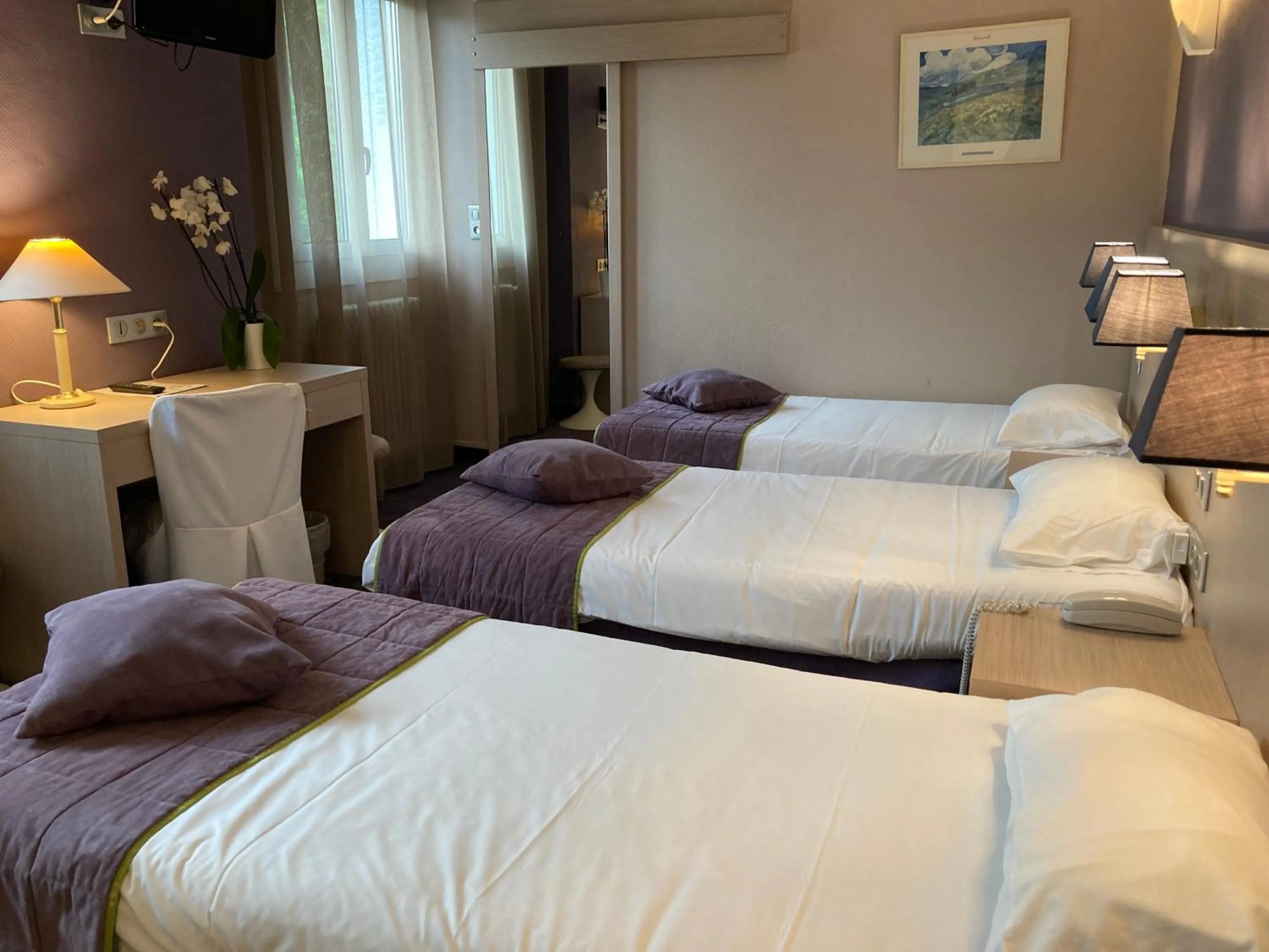 Bedroom, Bed in Hôtel Christina Lourdes