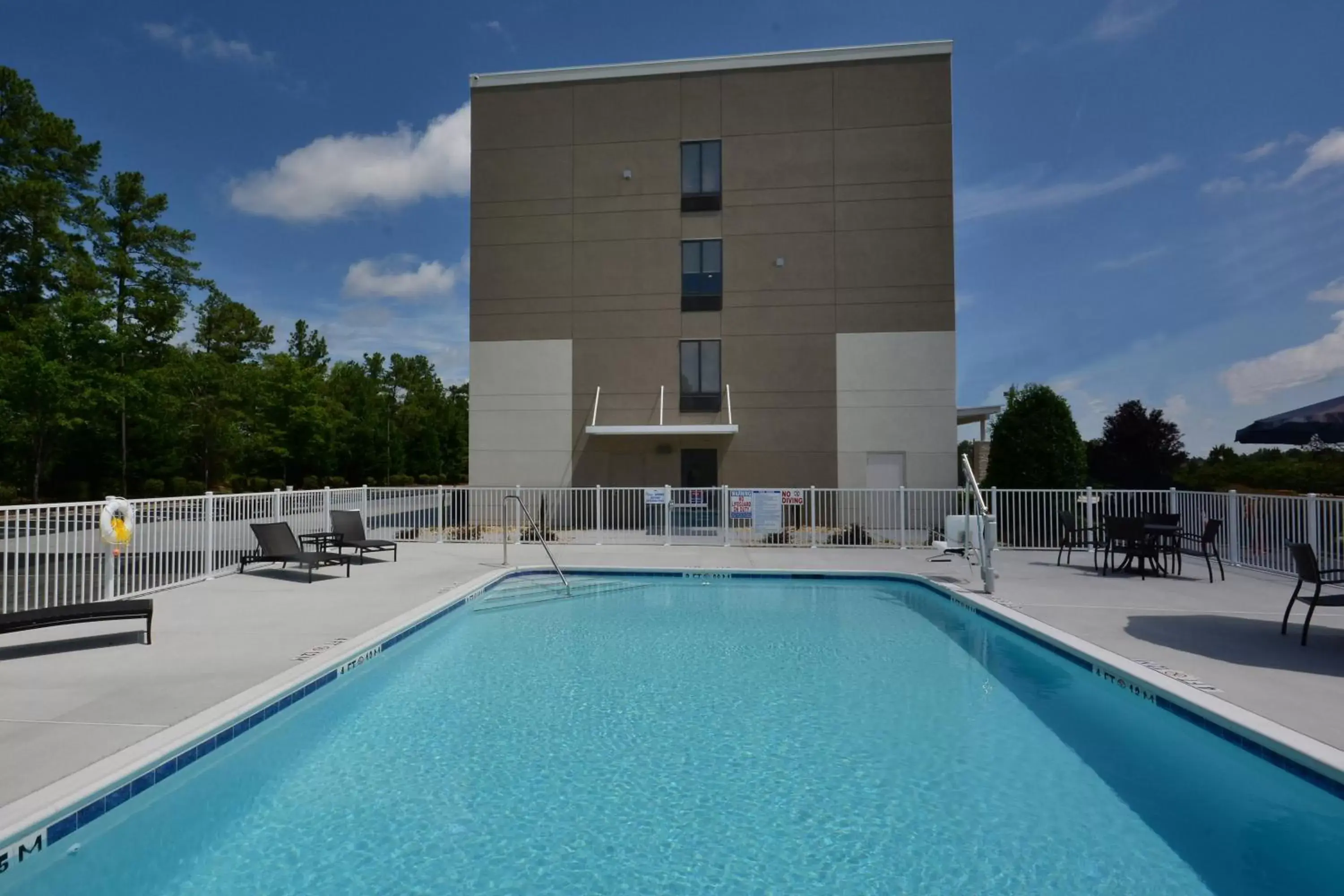 Swimming Pool in Holiday Inn Express & Suites Raleigh Durham Airport at RTP, an IHG Hotel